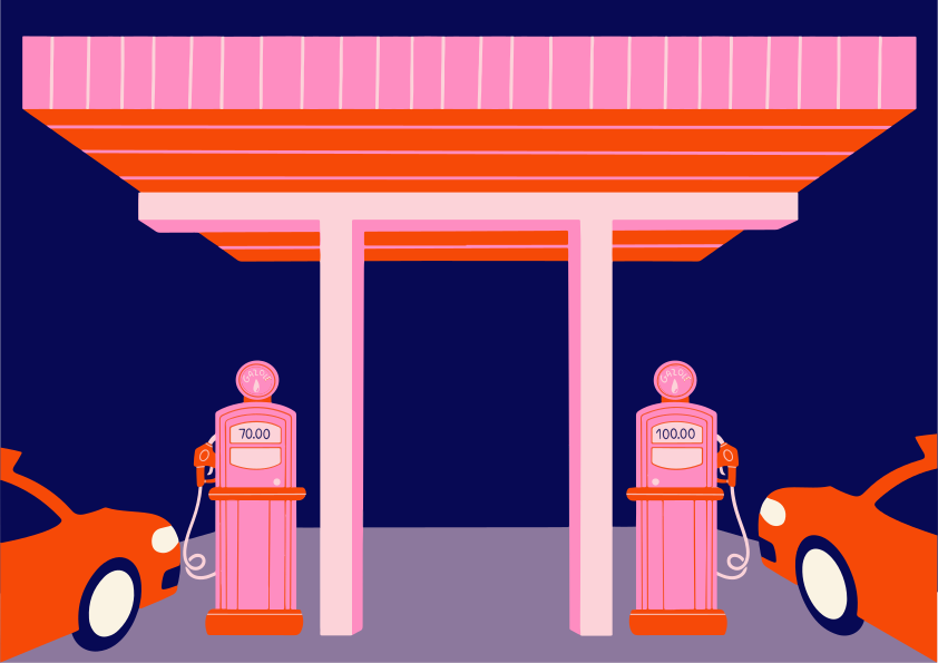 Two cars at a retro gas station at night