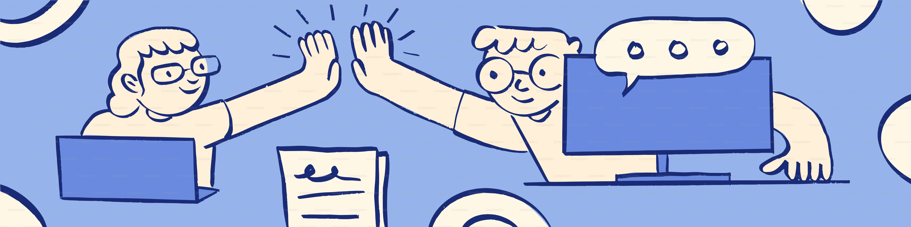 Two people high-fiving over computers in a meeting.