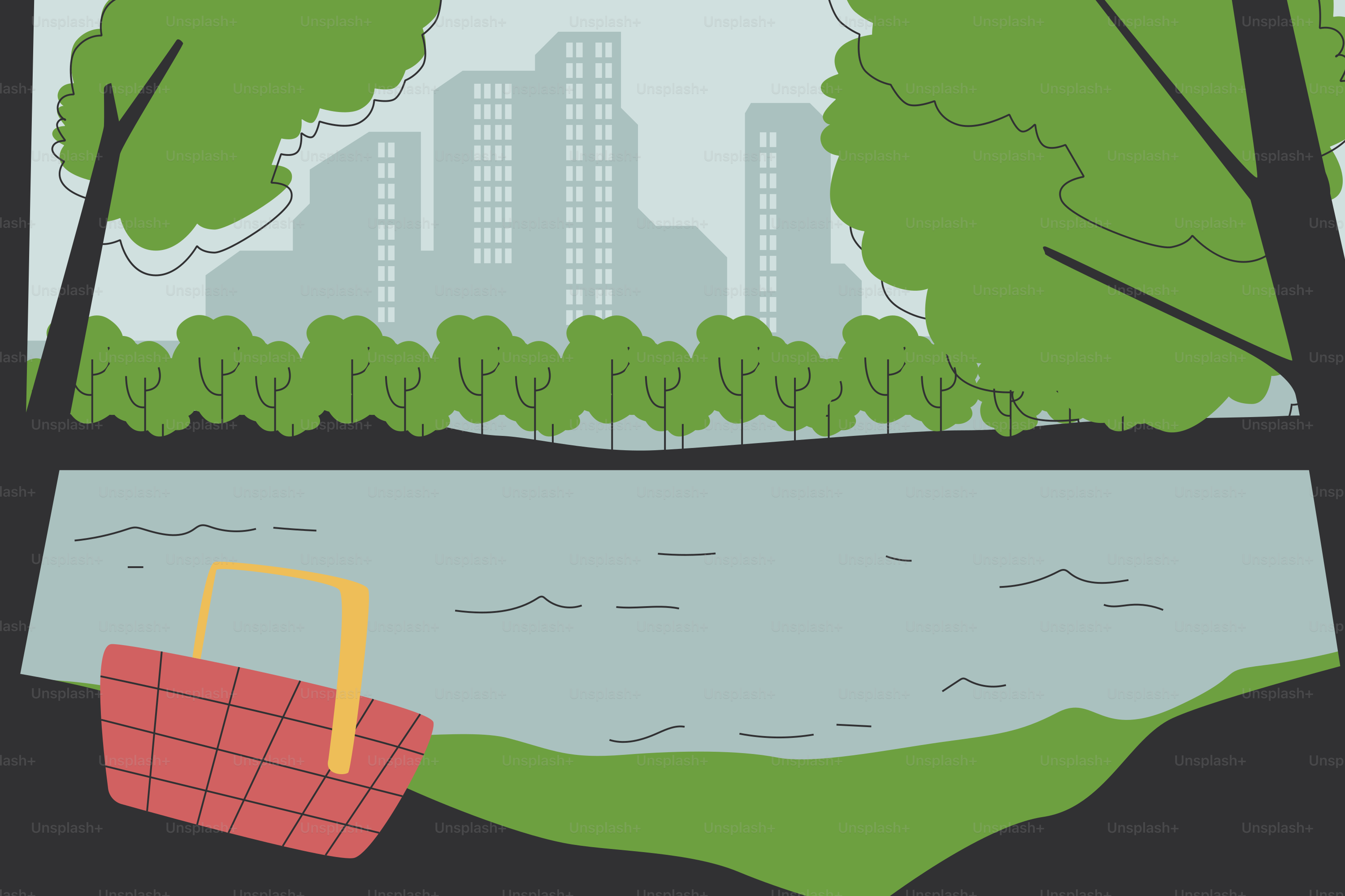 Cesta de picnic junto a un lago tranquilo con el perfil de la ciudad.