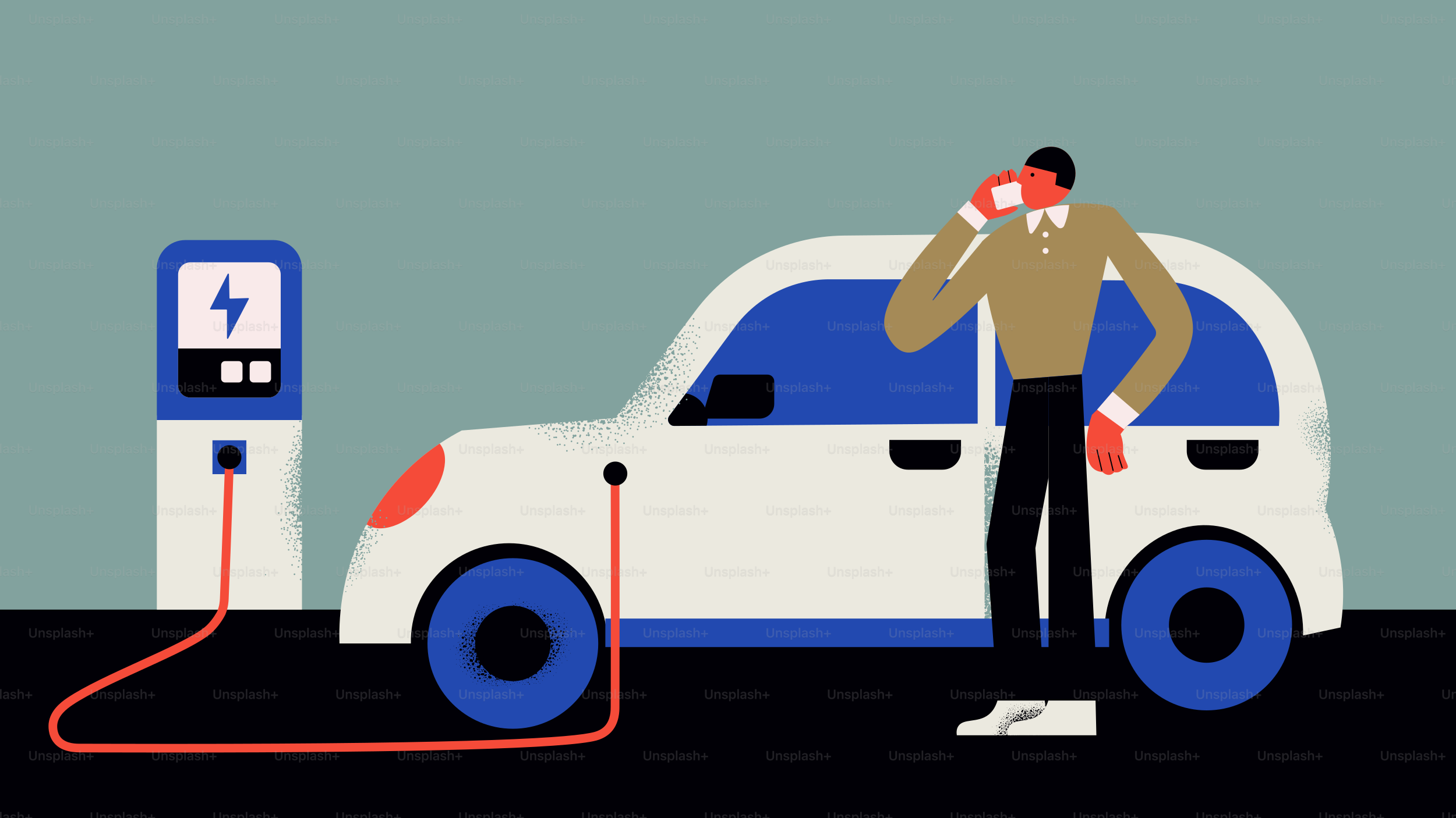 Man talking on phone while electric car charges