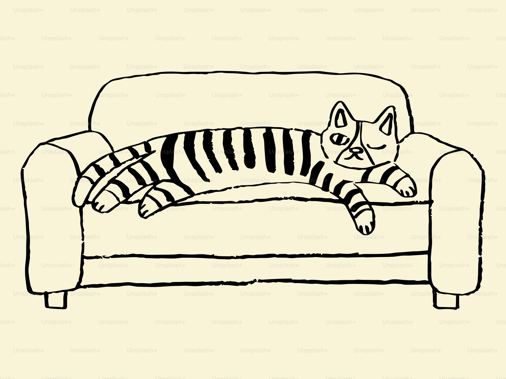 Striped cat sleeping on a couch