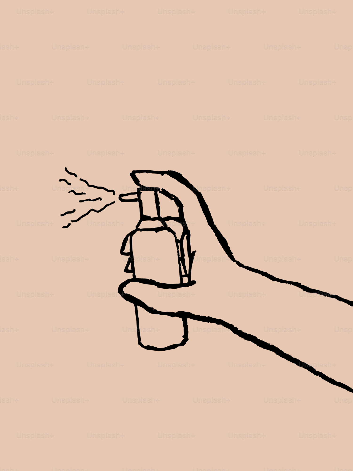 Hand spraying a bottle with mist
