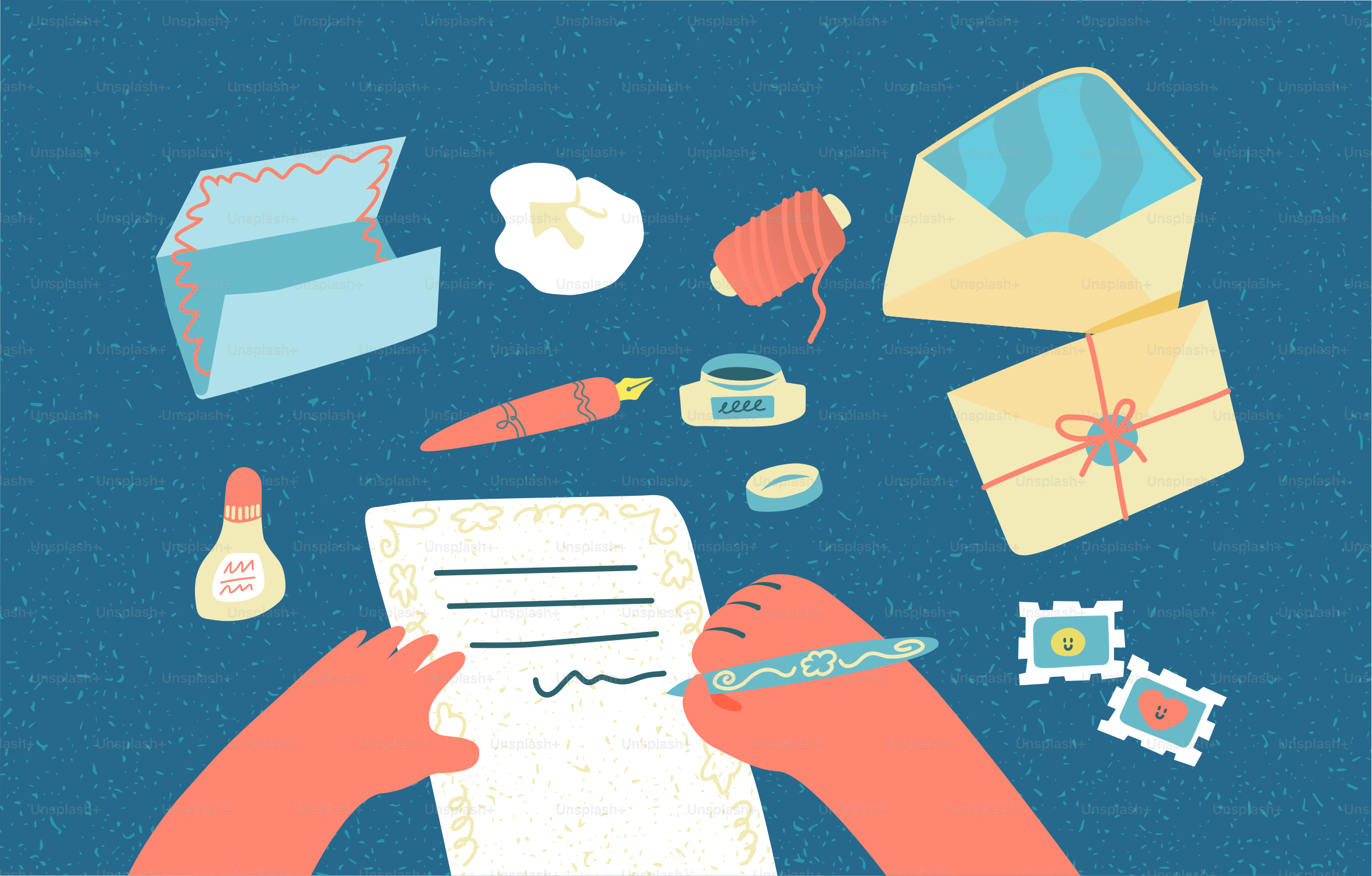 Hands writing a letter with stationery and stamps.