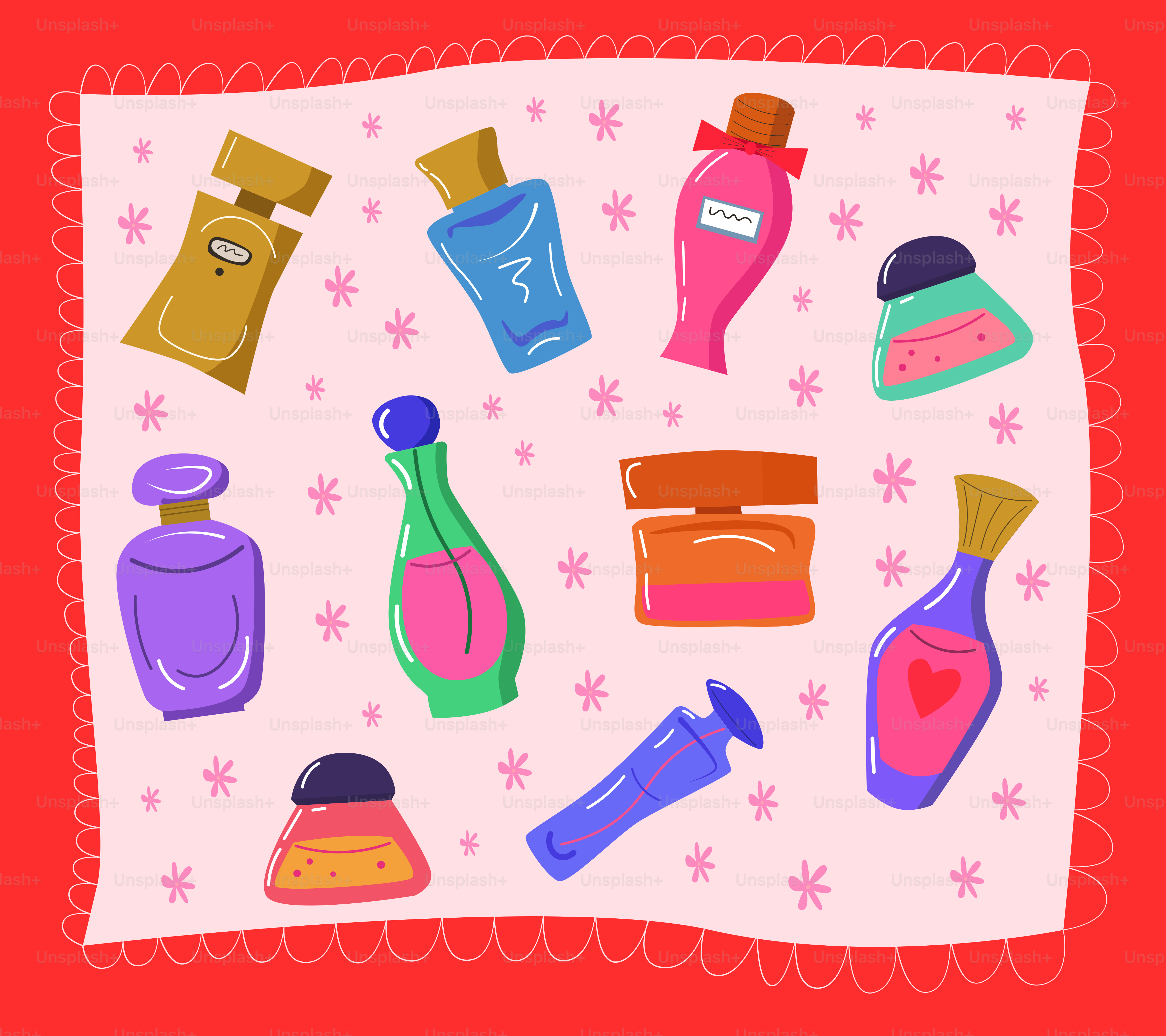 Assortment of colorful perfume bottles on a pink background.