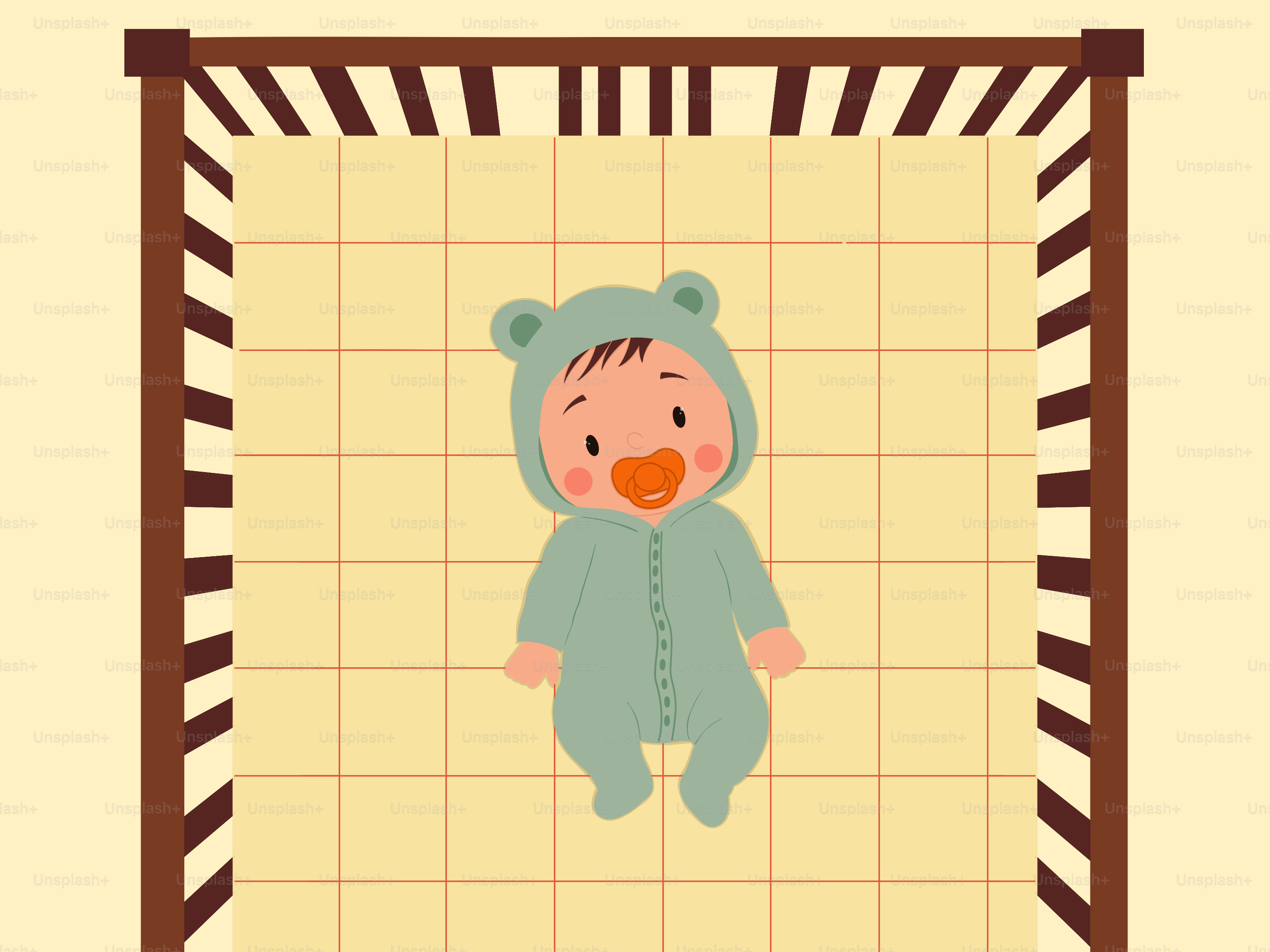 ベビーベッドにおしゃぶりをつけたクマのコスチュームを着た赤ちゃん
