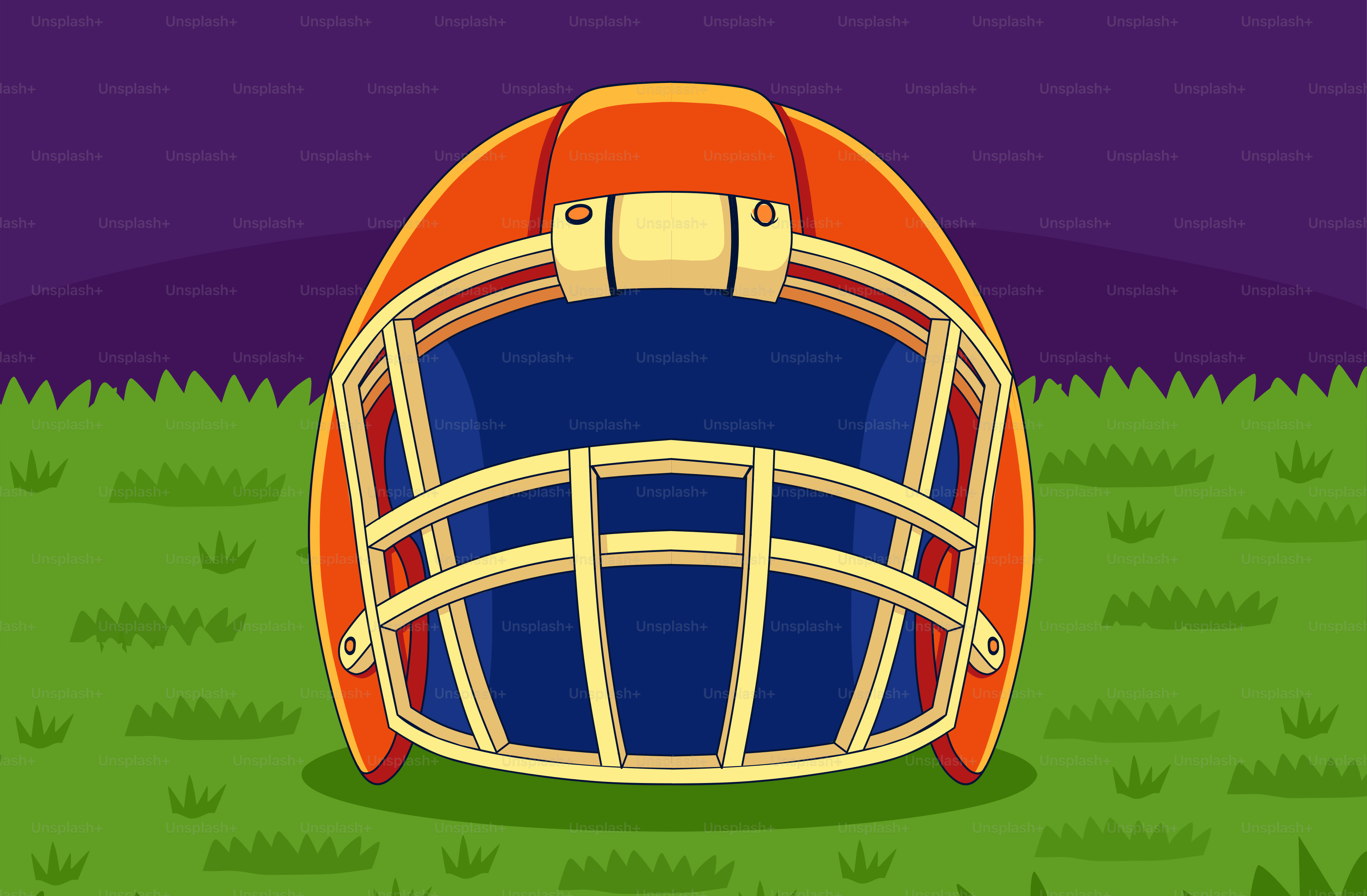 An orange football helmet on green grass