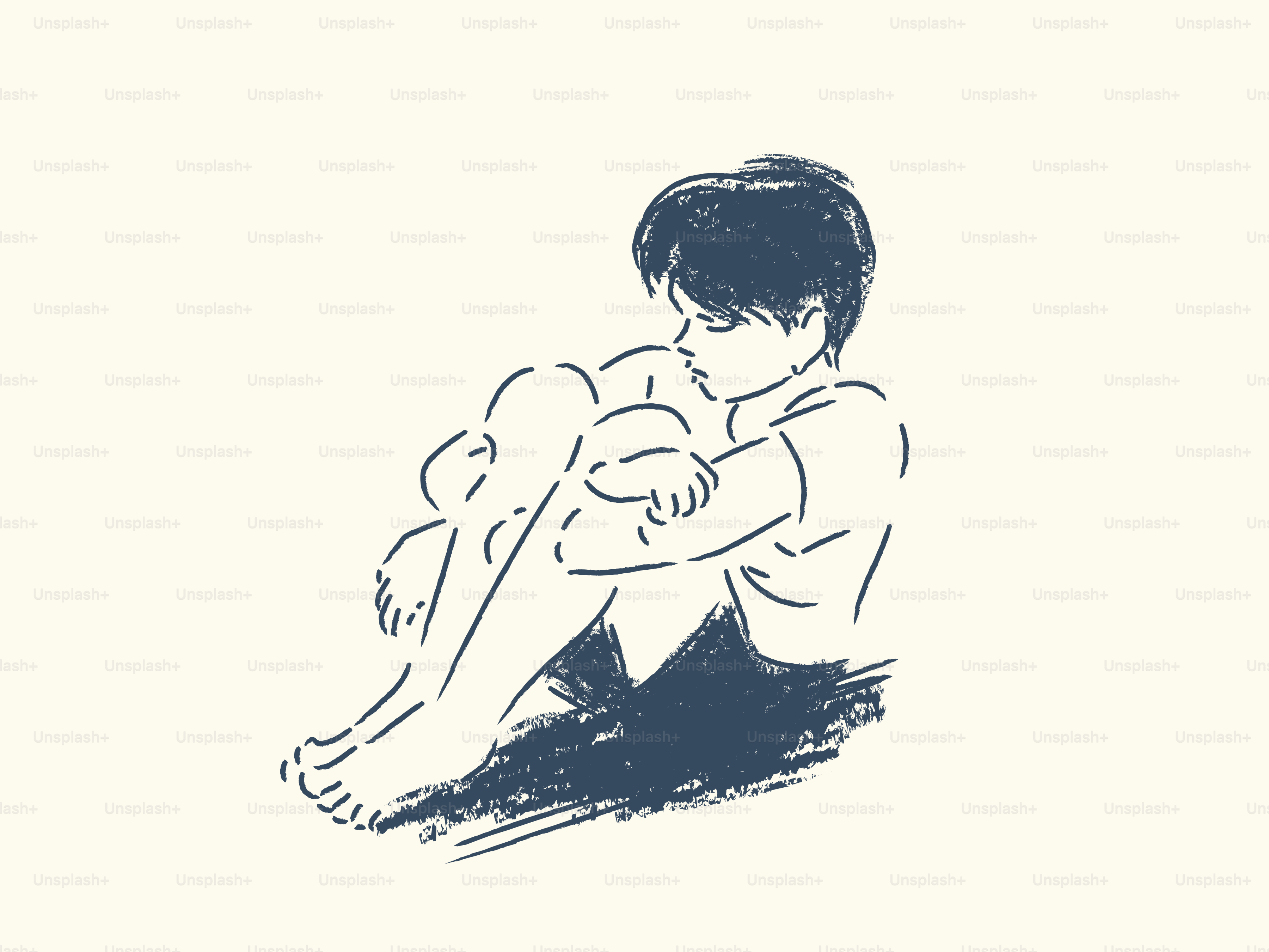 A young person curled up, resting their head on knees.