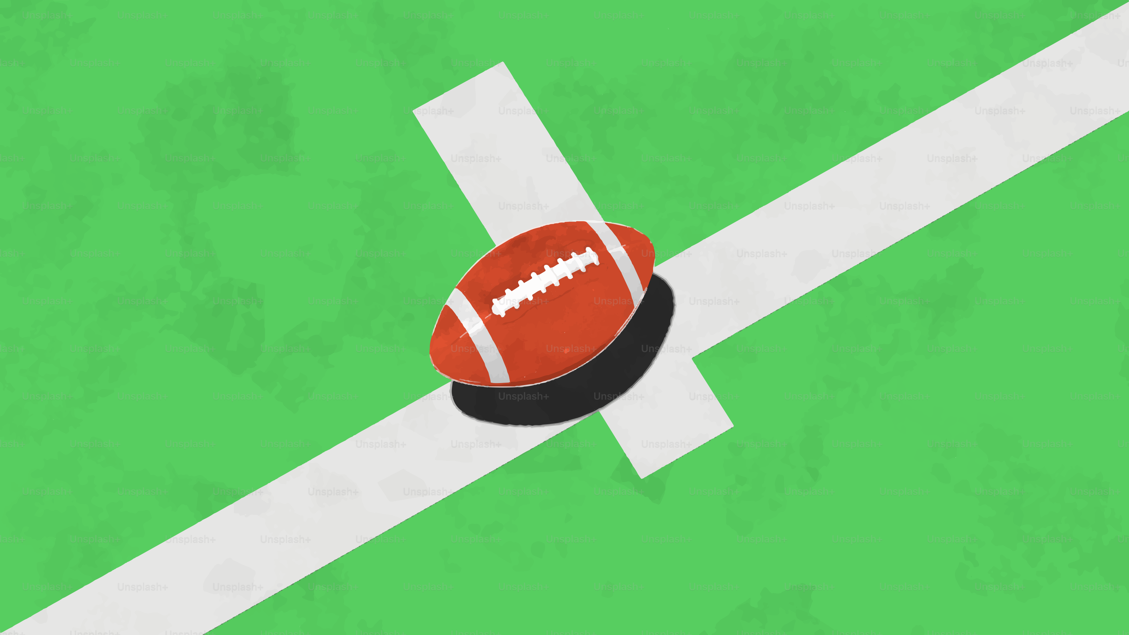American football on a green field with white lines