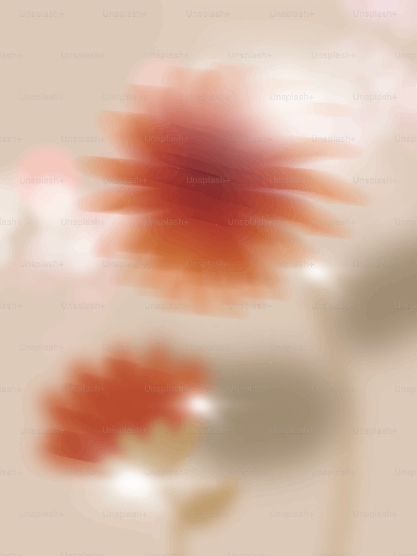 Abstract floral design with soft, blurred colors.