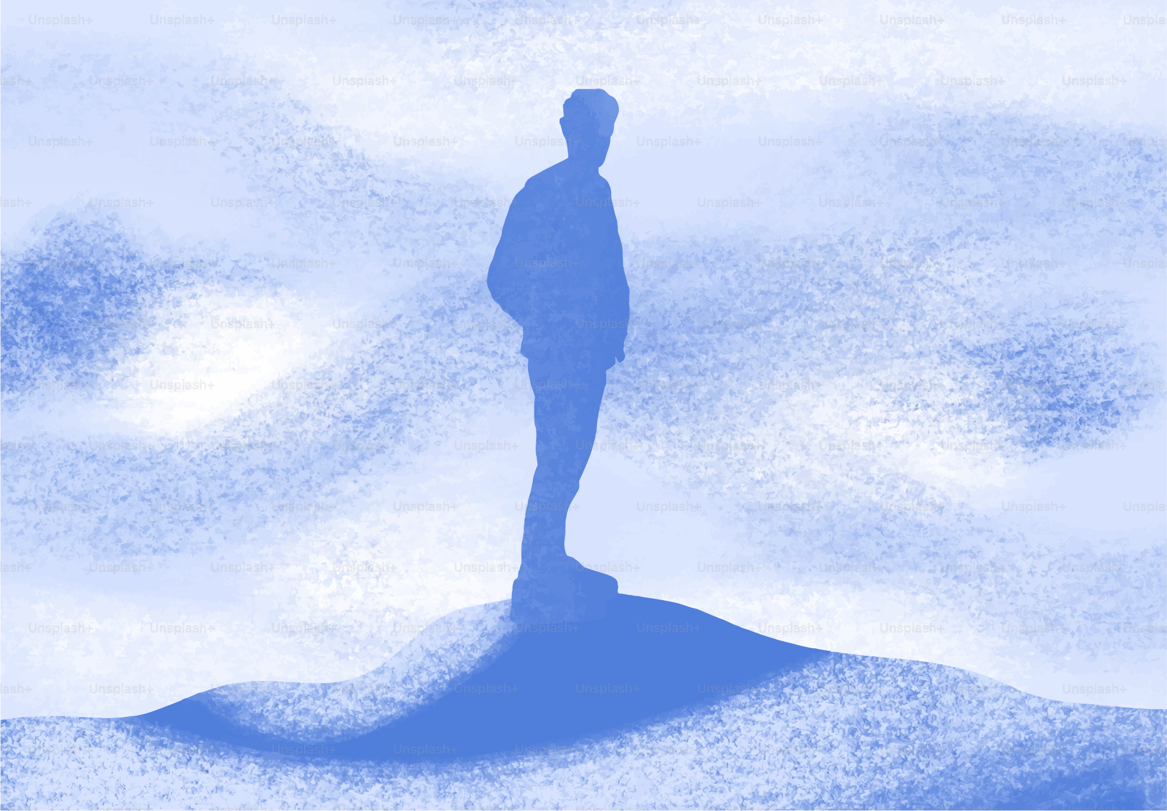 언덕 위에 서 있는 사람의 실루엣.