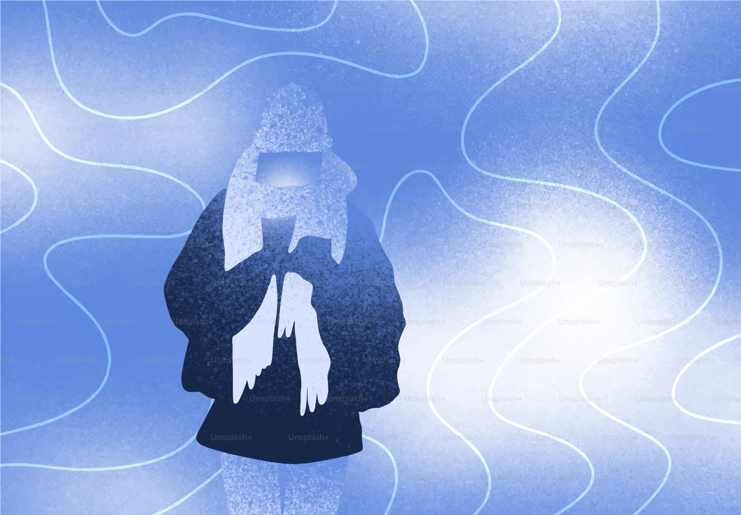 Persona in abiti invernali che guarda un telefono