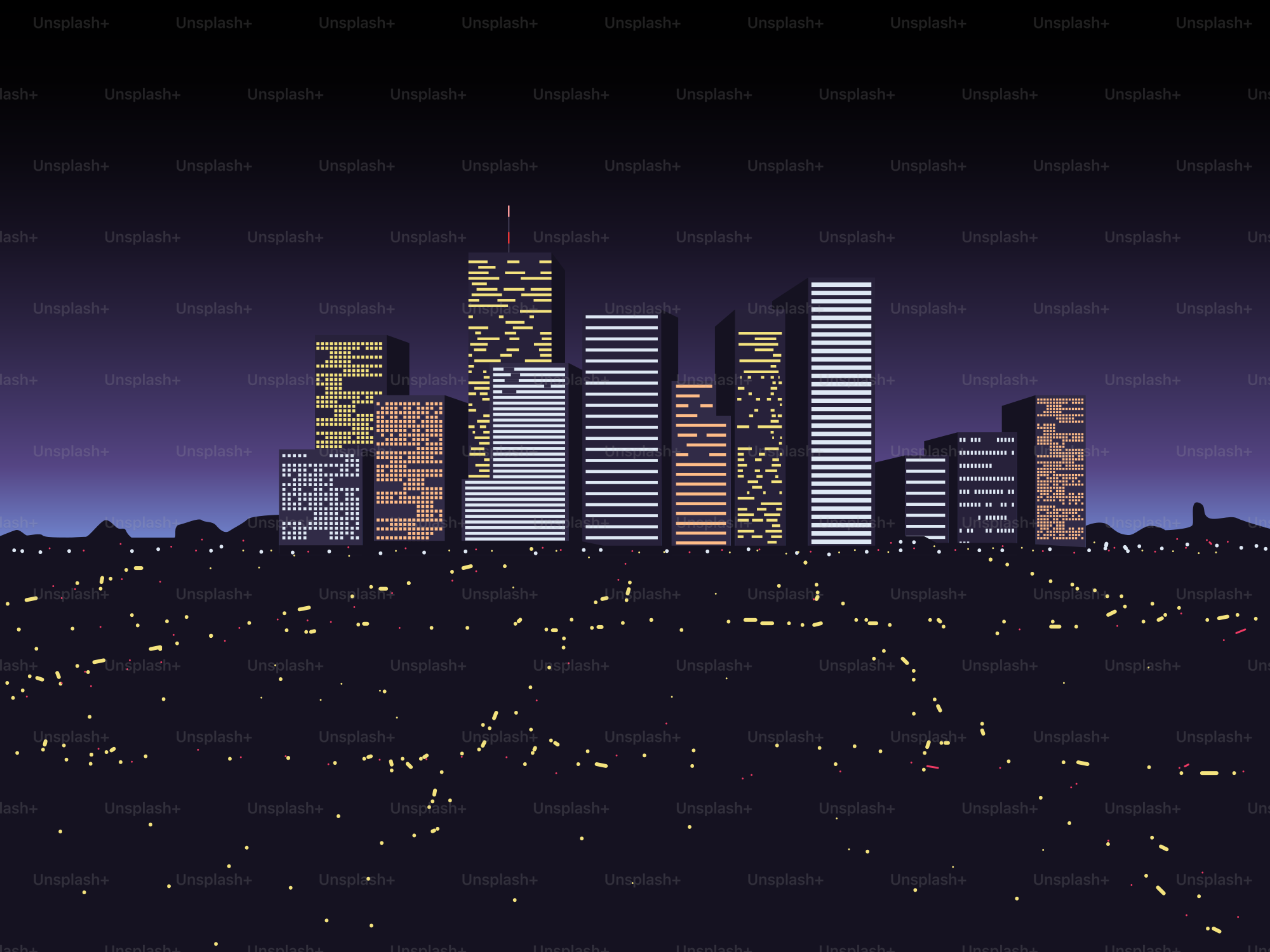 City skyline at night with glowing lights