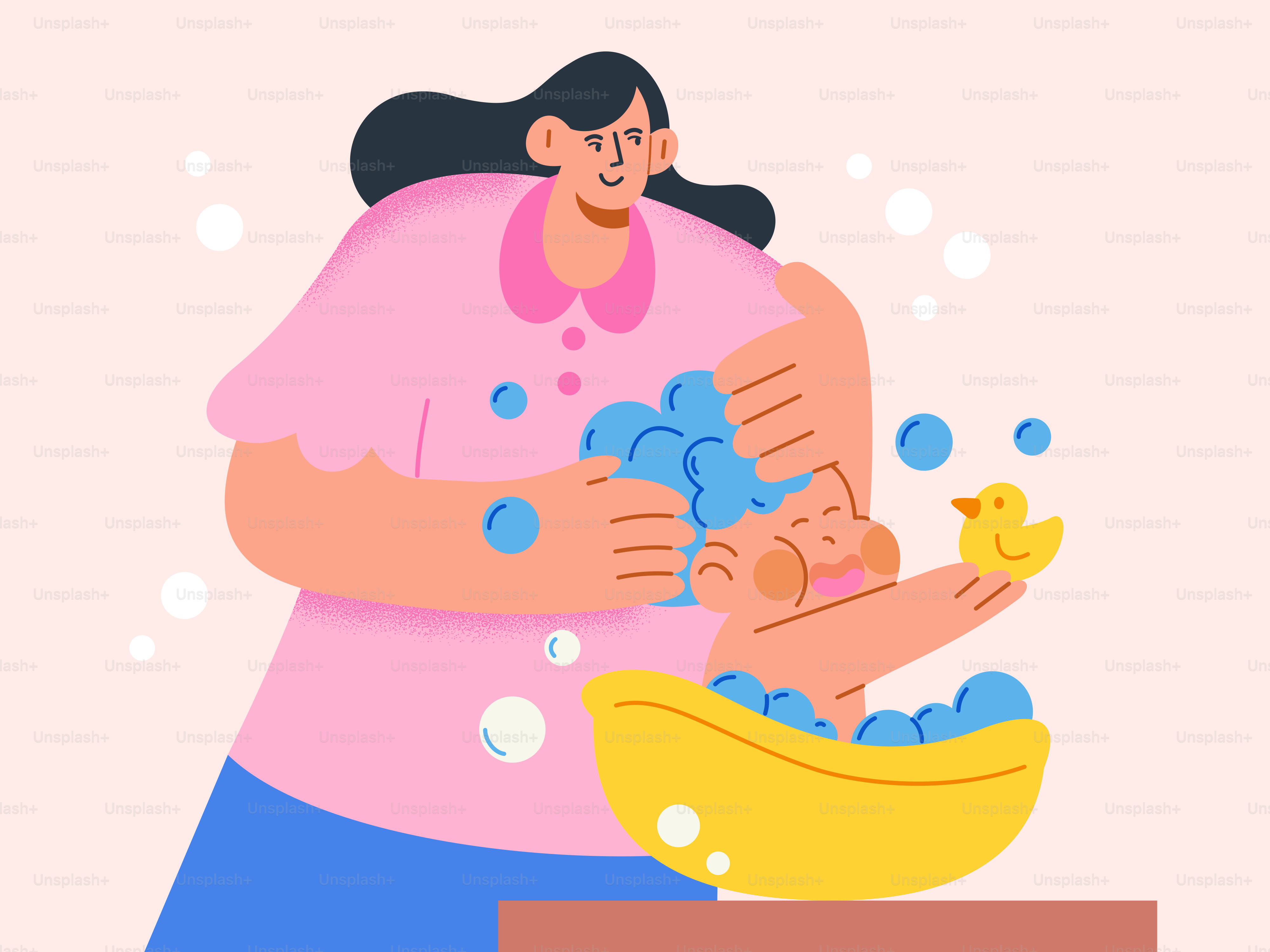 Mother bathing her baby with a rubber duck.