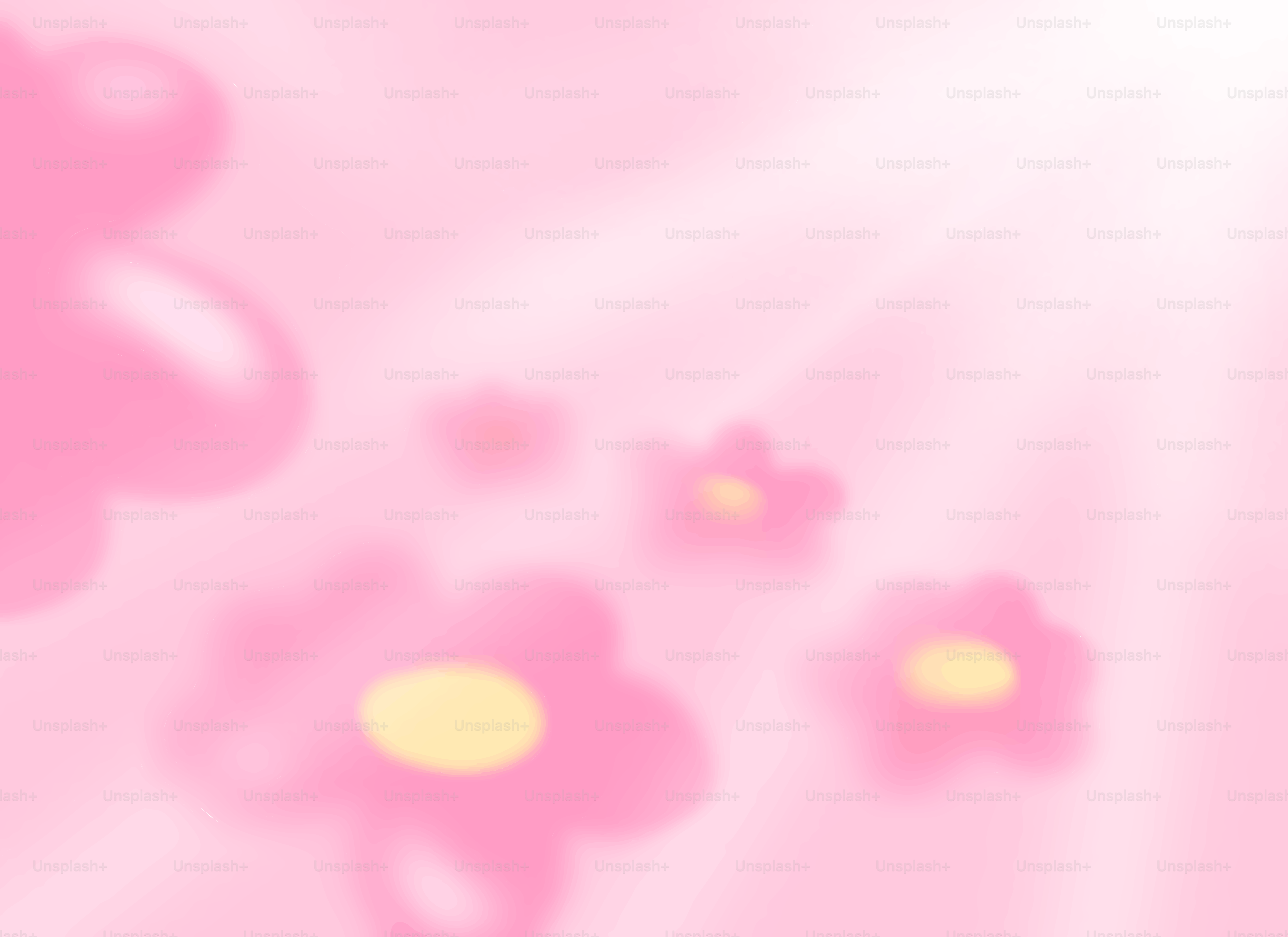 Soft pink flowers with yellow centers on a light background