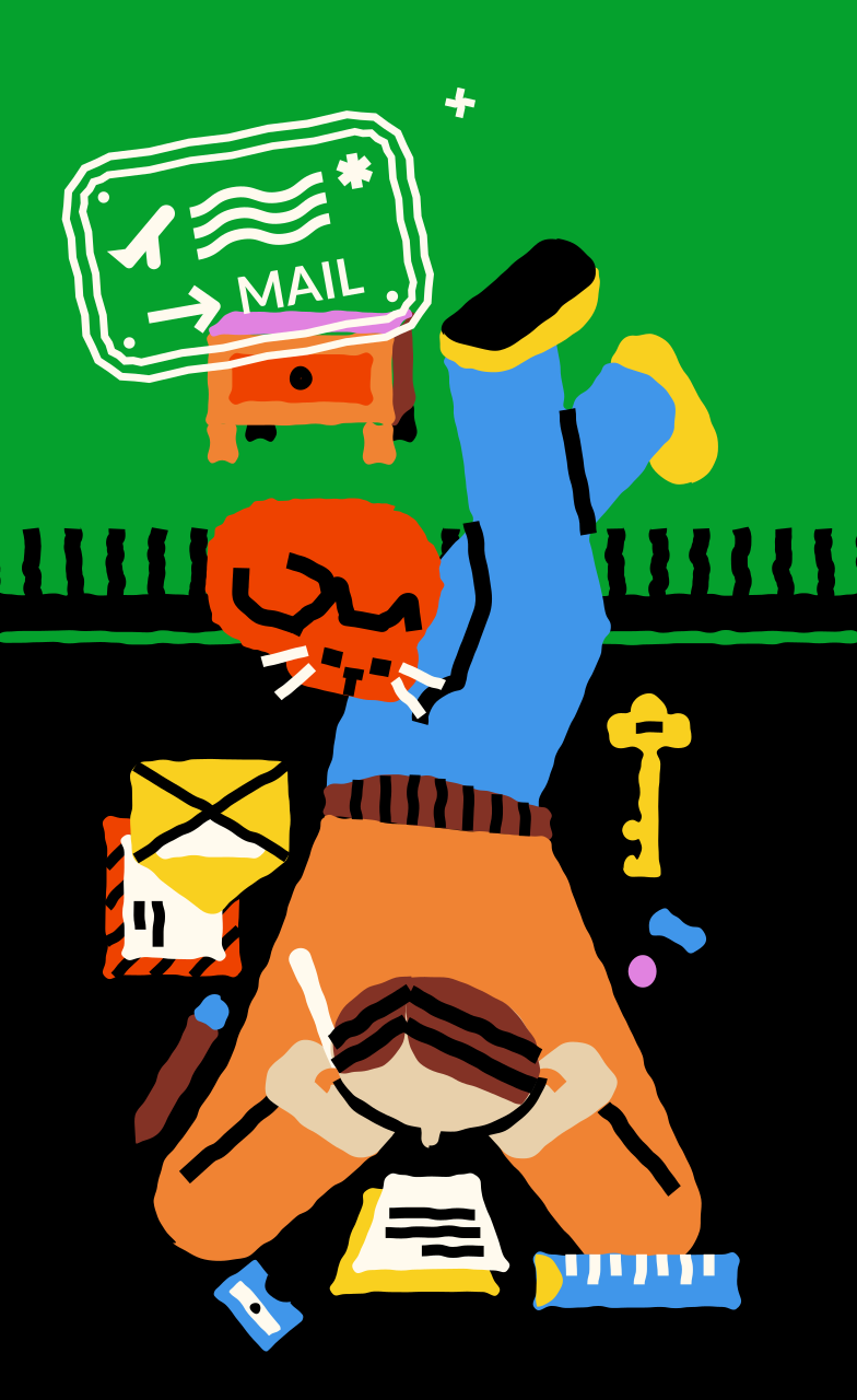 Person writing at a desk with mail and key.