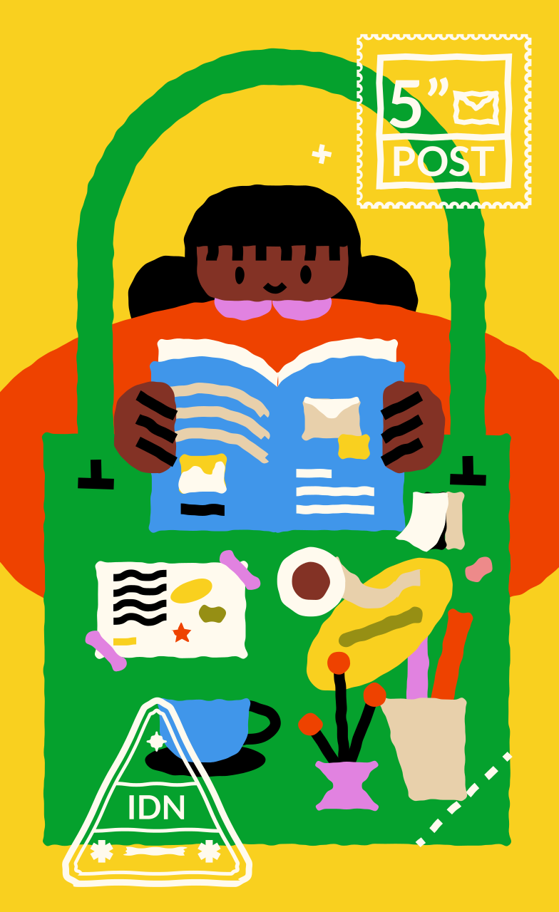 A girl reading a book with various items around her