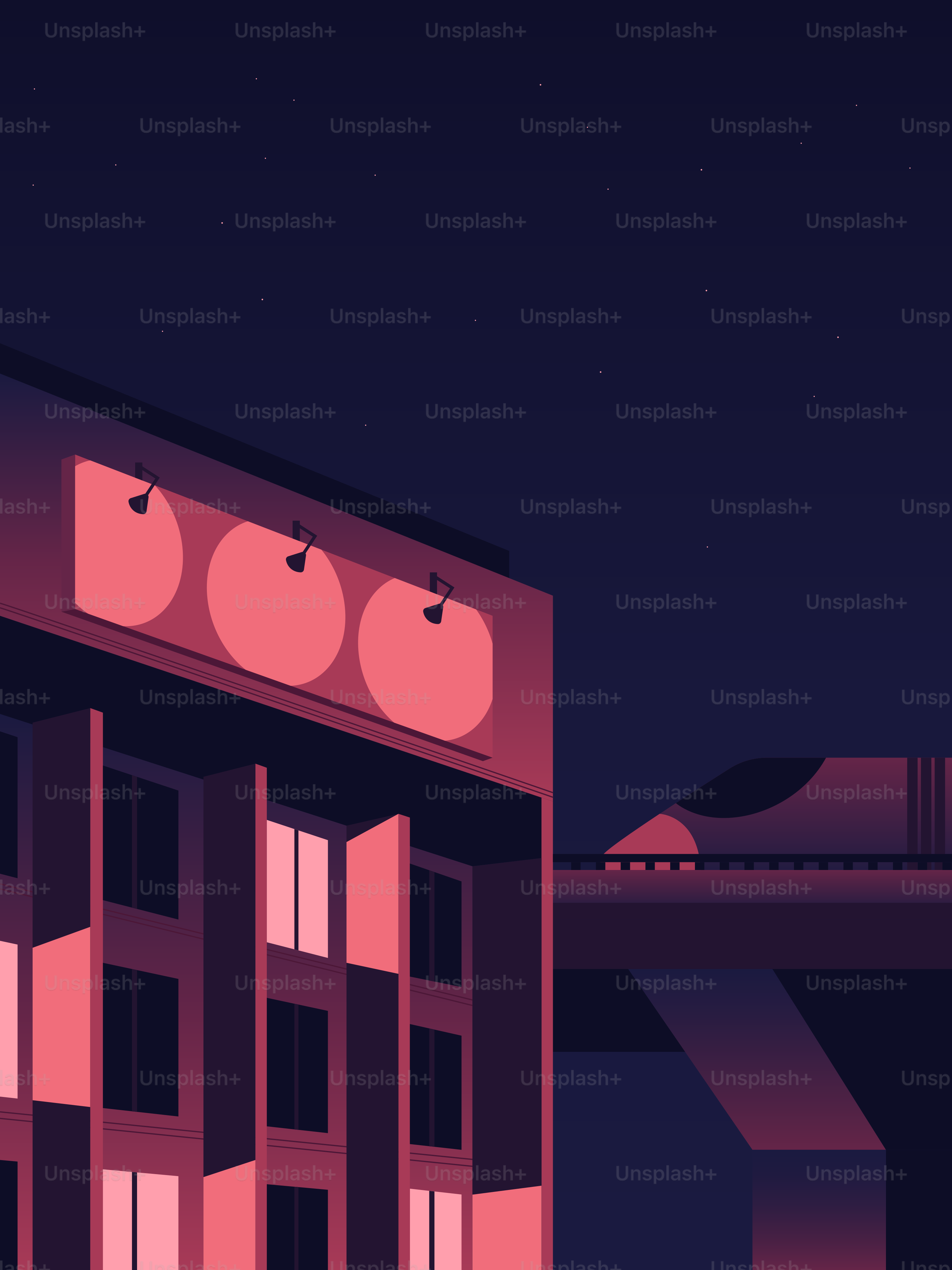 A train passes a building at night.