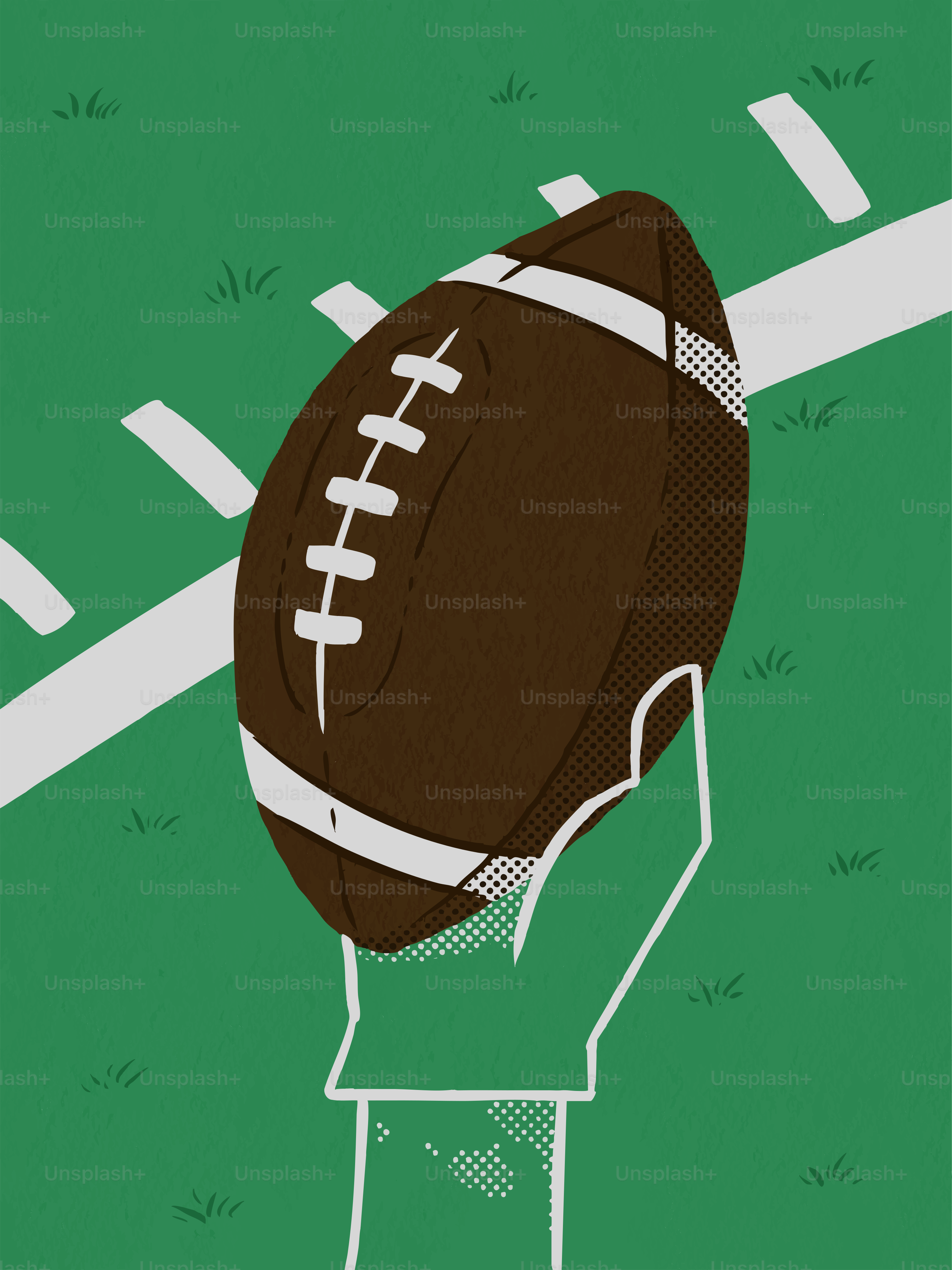 Hand holding a football on a green field.