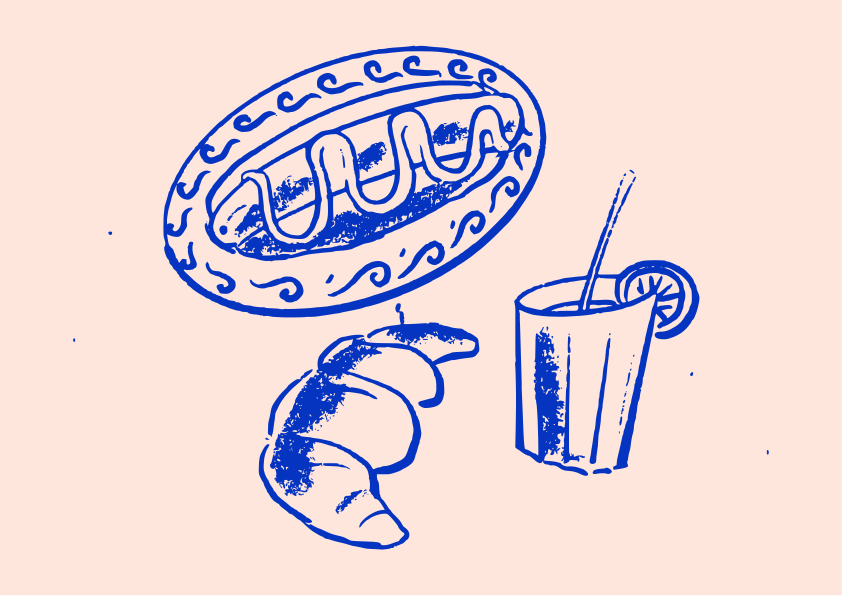 A hot dog, croissant, and drink with lemon.