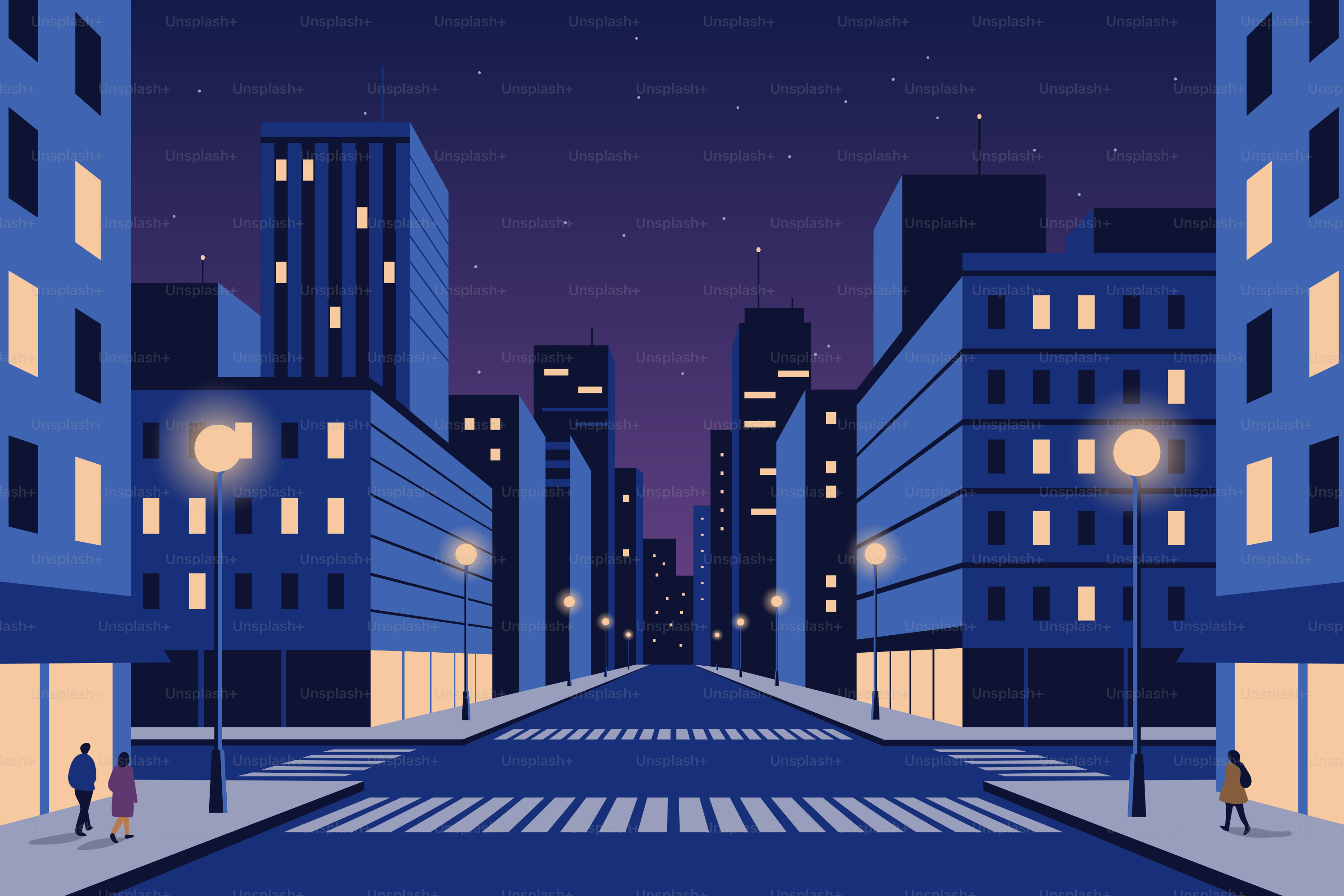 Una calle de la ciudad de noche con edificios iluminados.