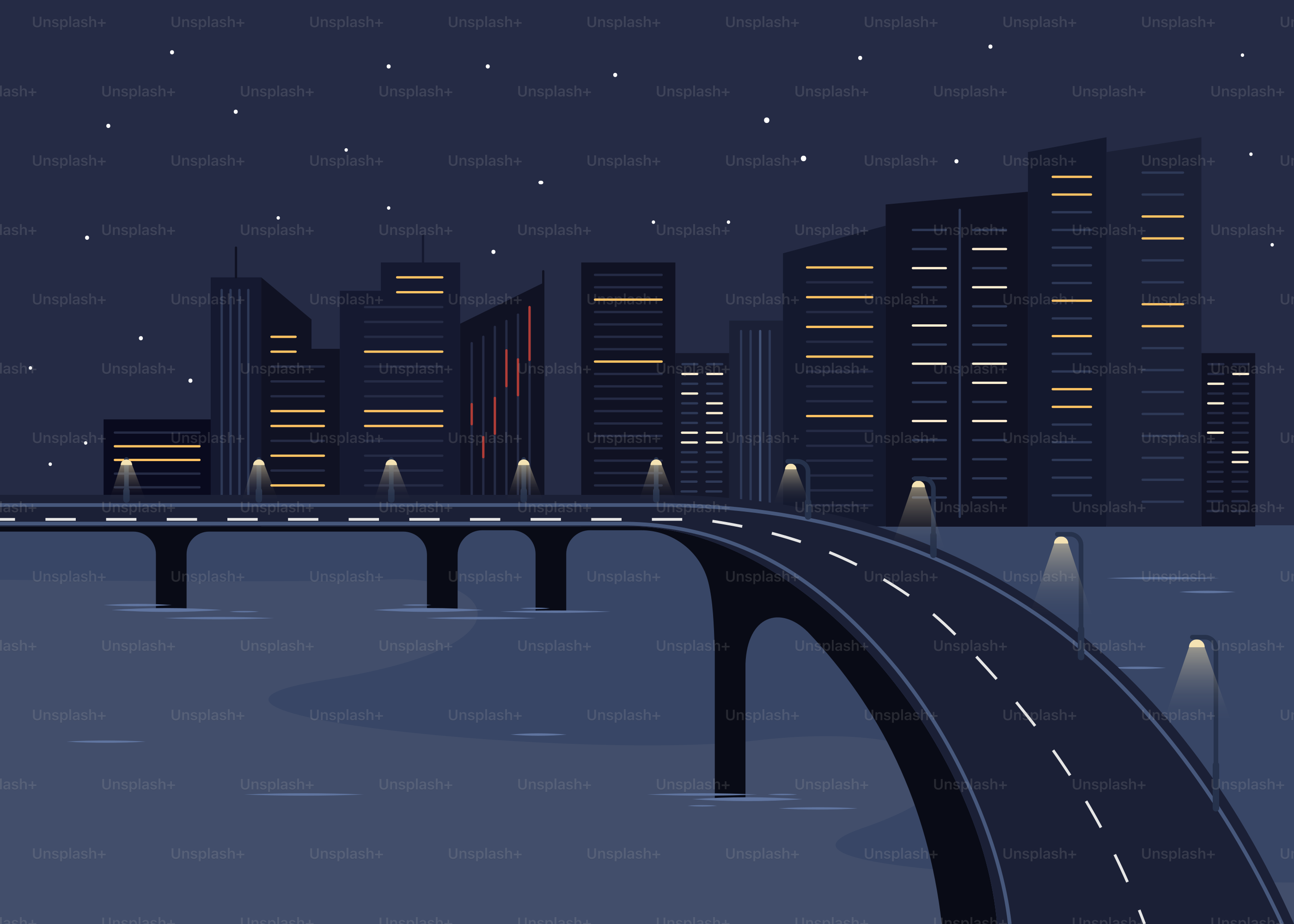 Uno skyline di città di notte con un ponte stradale.