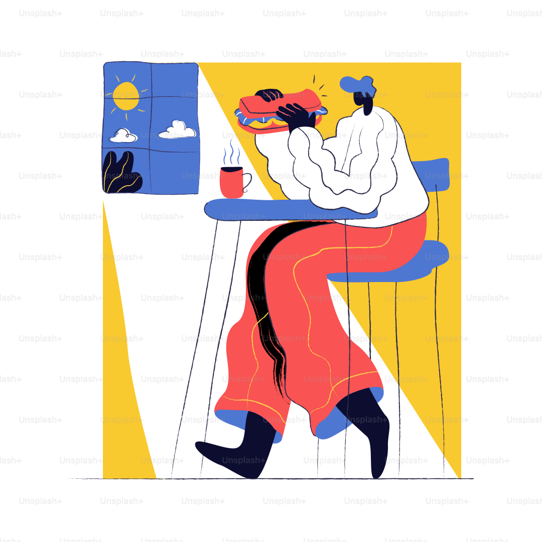 テーブルでサンドイッチを食べている人