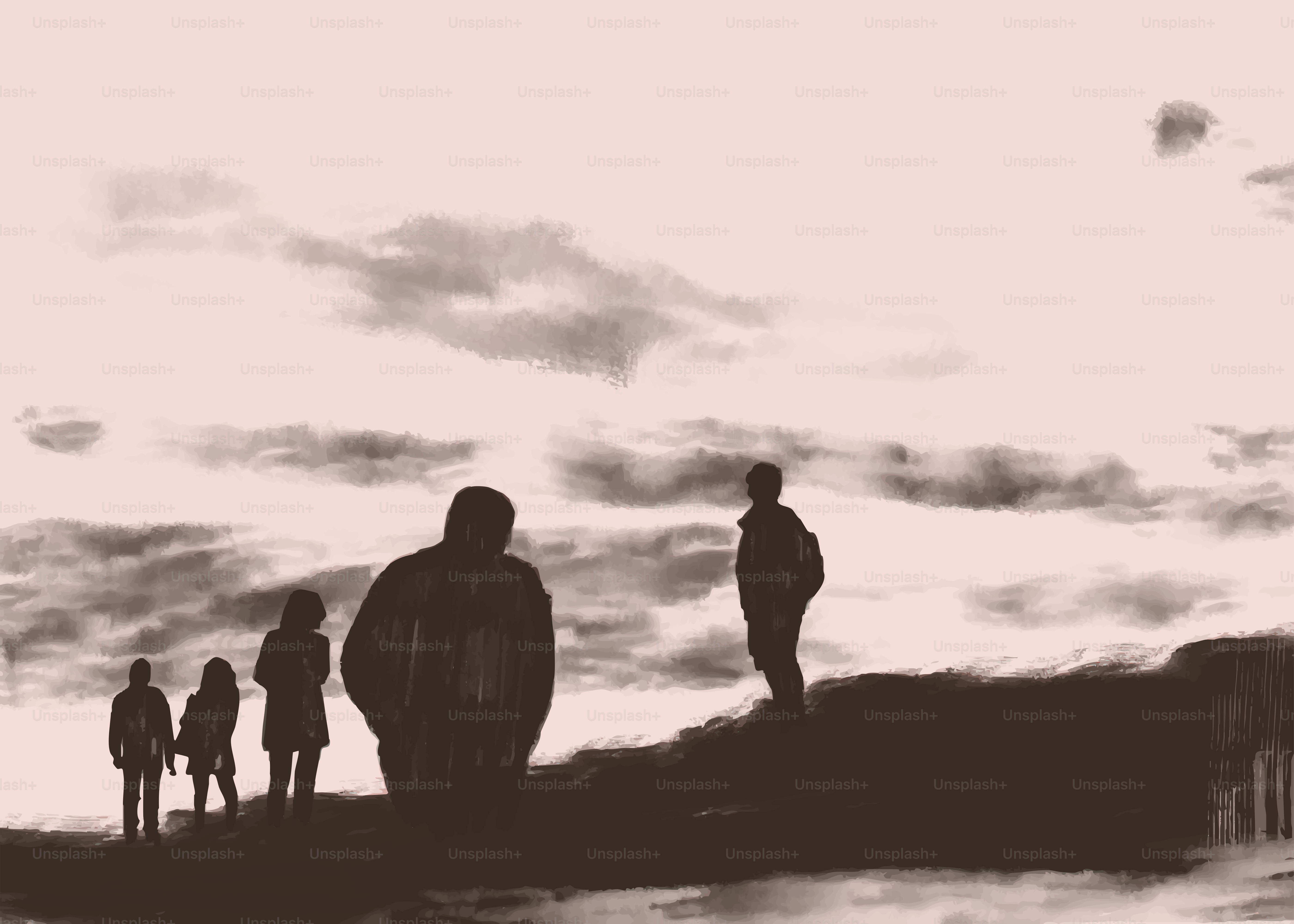Silhouettes of people walking on a hill at sunset