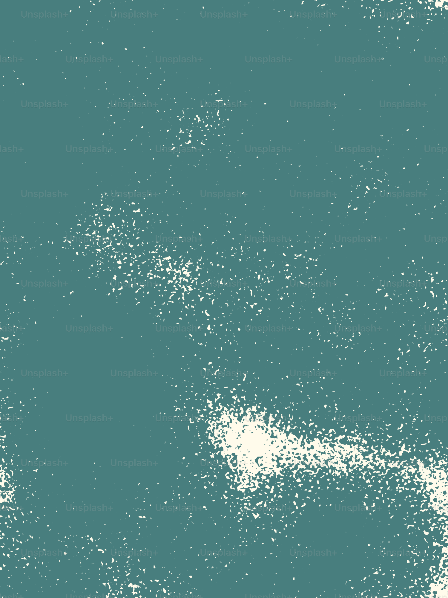 Teal background with white speckles and splotches
