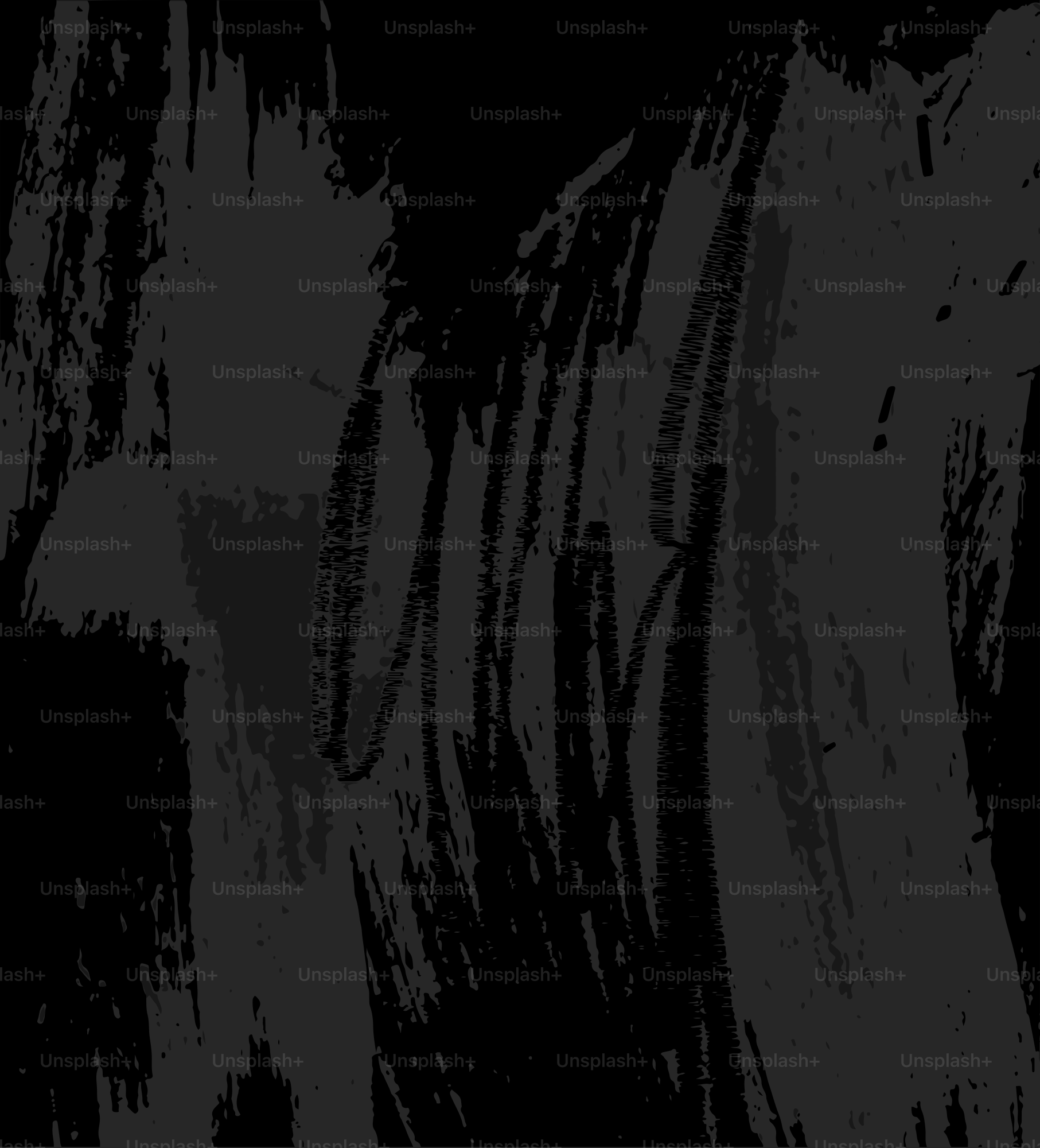 Abstract dark grey brush strokes on black background