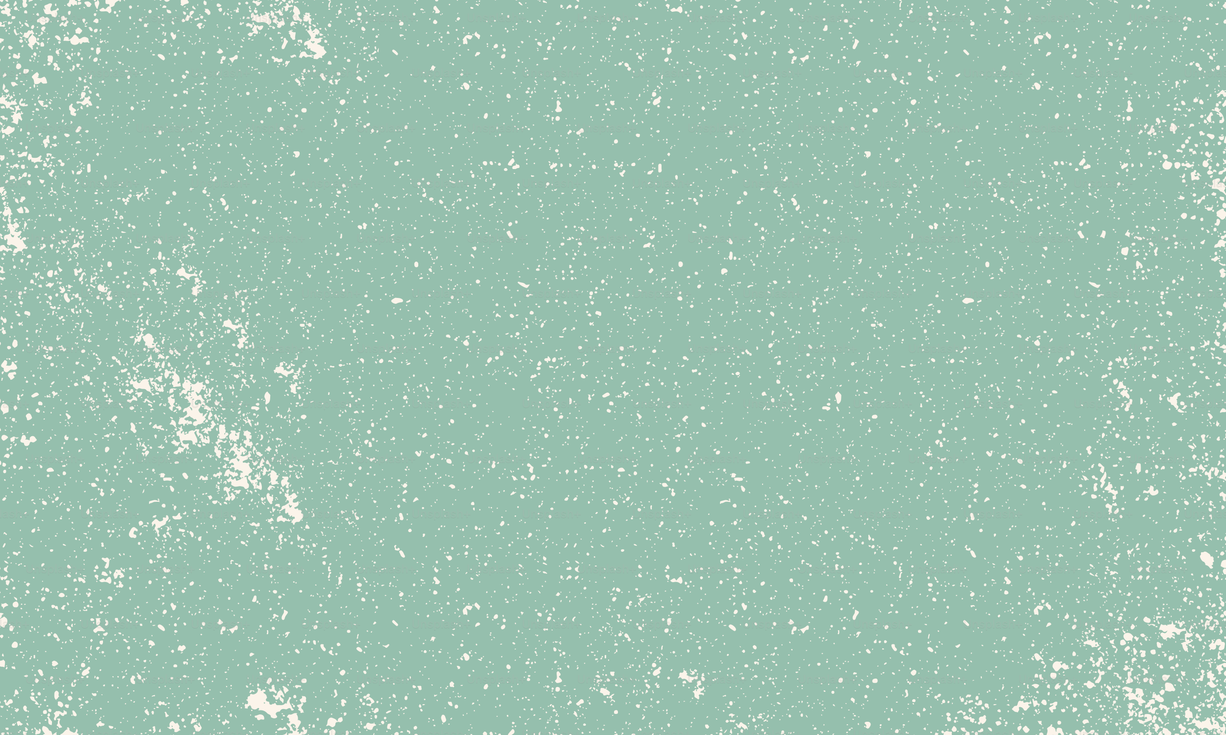 A muted teal background with white speckles.