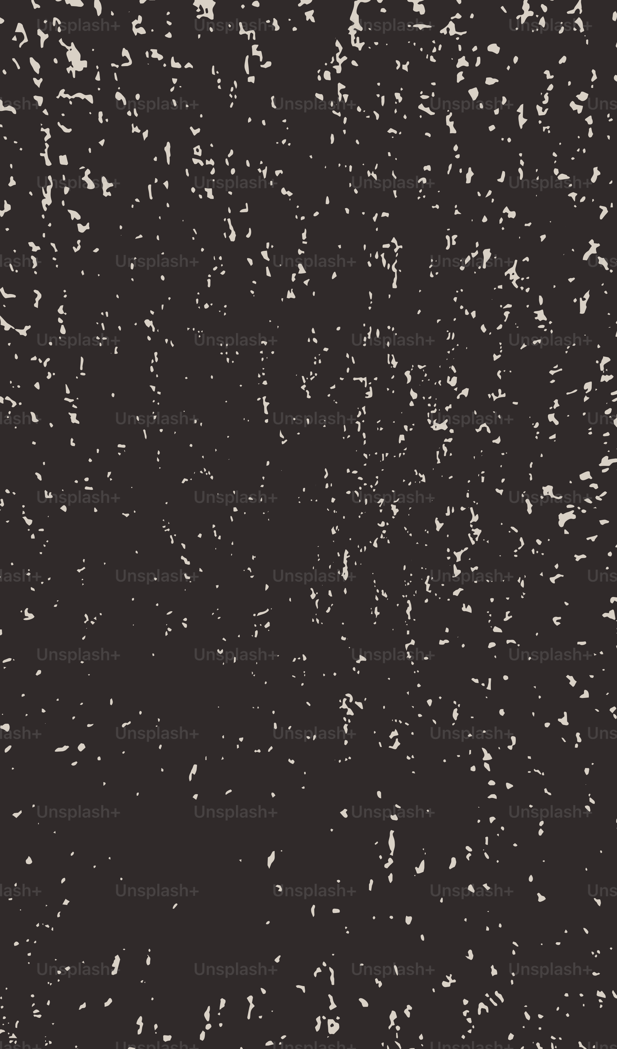 Dark textured background with white speckles