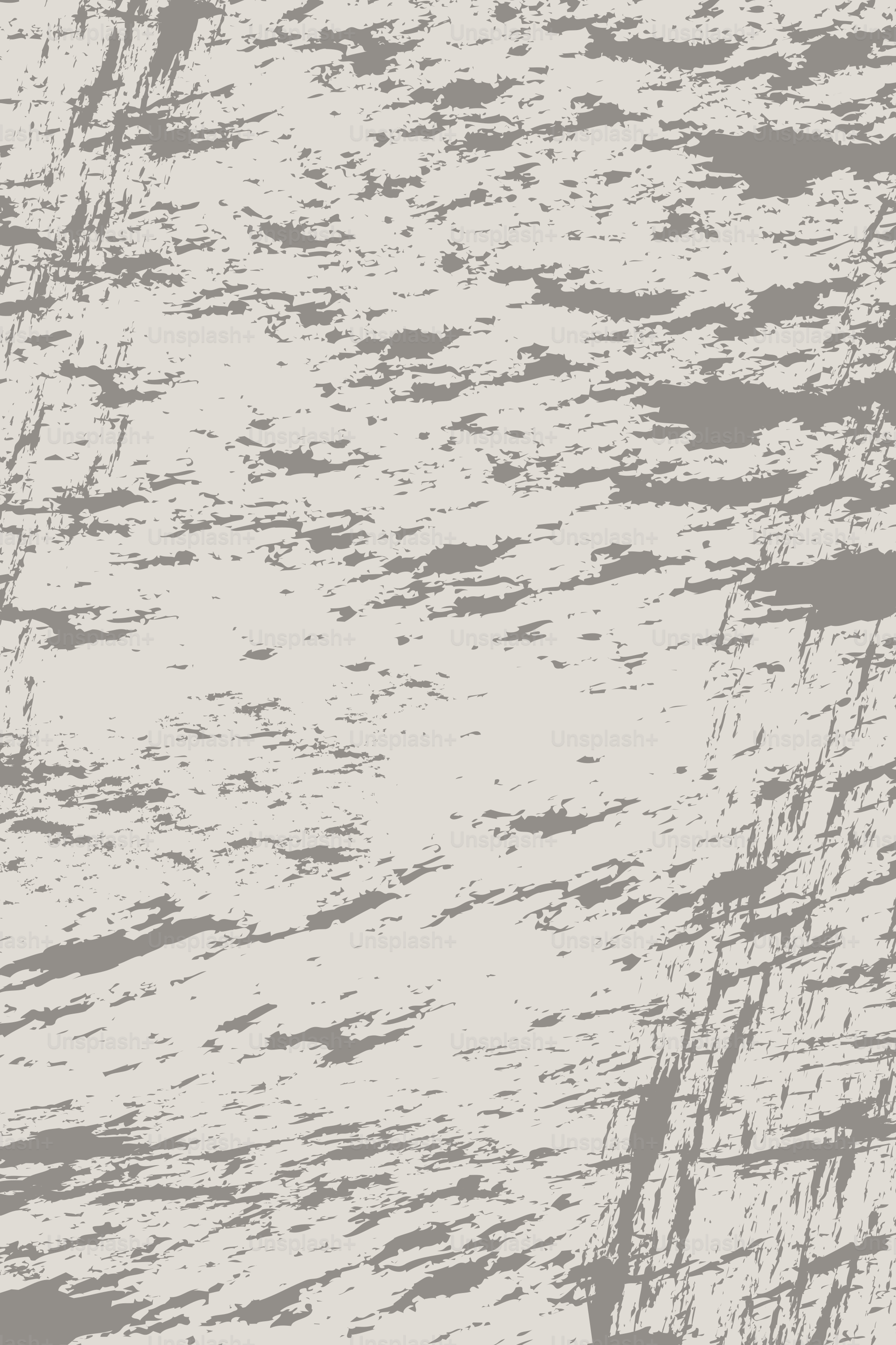 Abstrakter, strukturierter Hintergrund mit Grau- und Beigetönen.