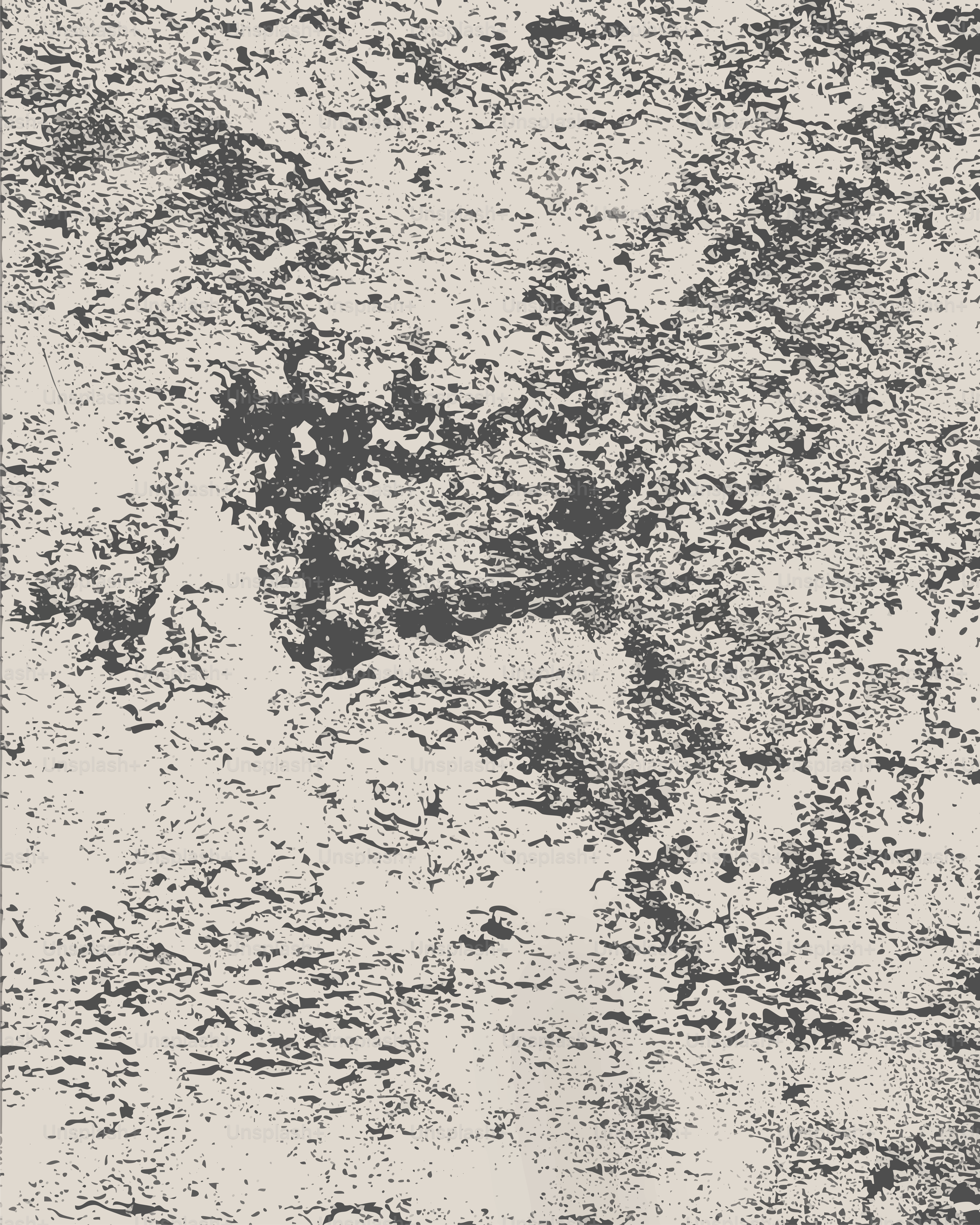 Rough textured surface with dark and light patterns