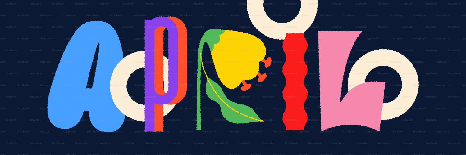 カラフルな文字で「abril」と花のデザインが綴られています。