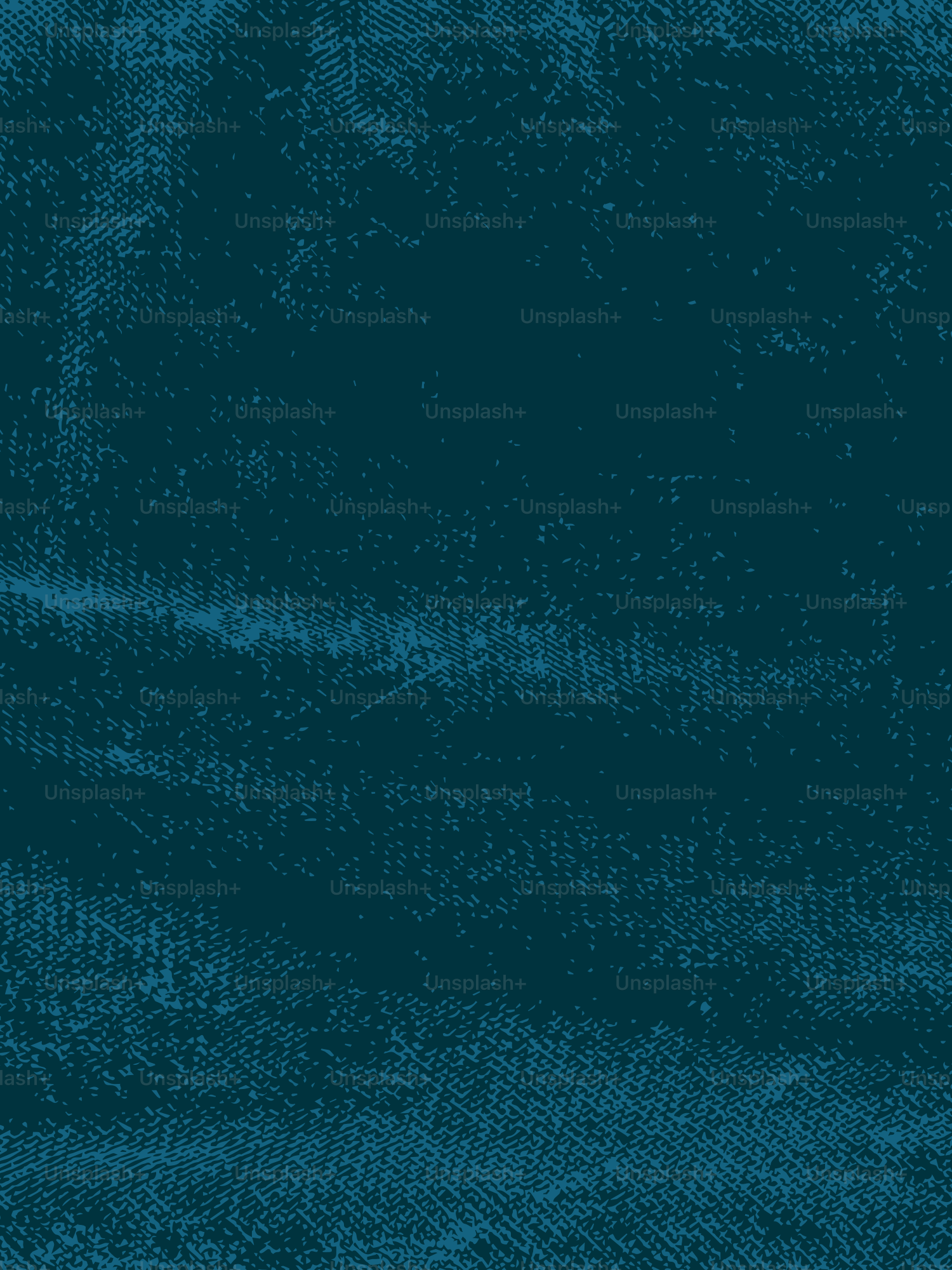 Teal textured fabric with subtle wrinkles and folds.