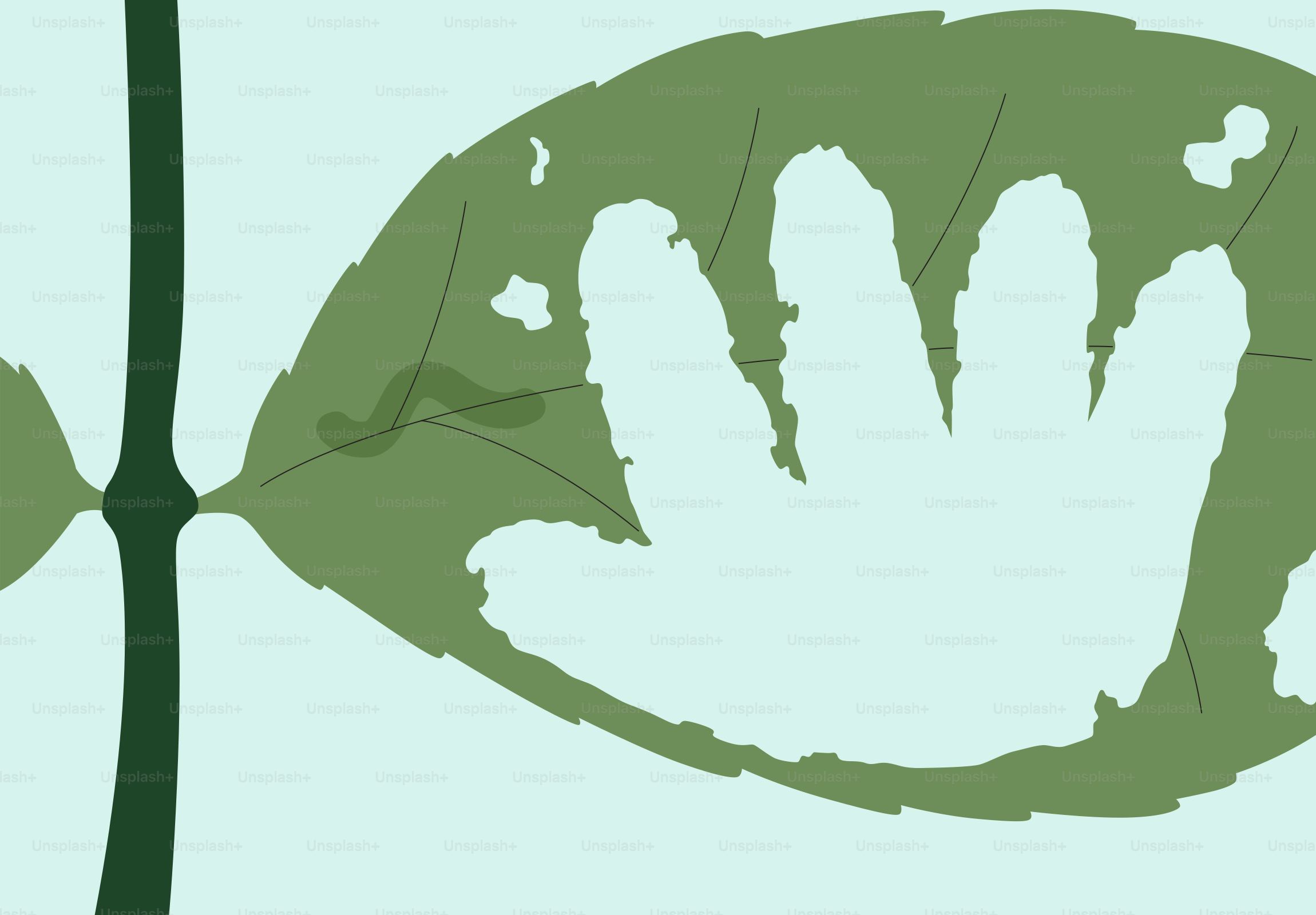 A handprint shape cut out of a green leaf.