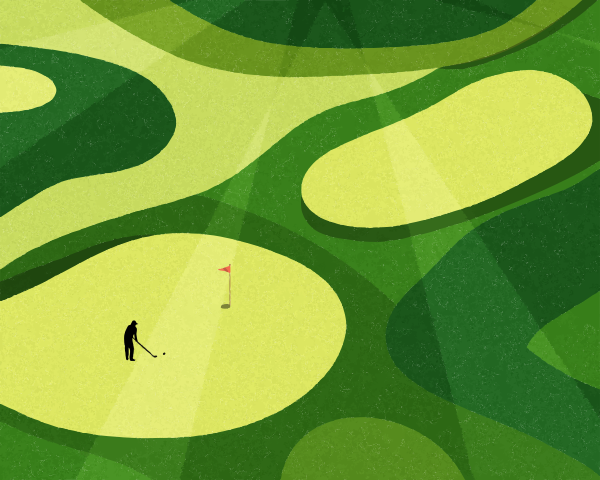 ゴルファーが旗を掲げたグリーンにパッティング