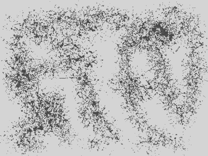 Fondo gris texturizado con motas oscuras.