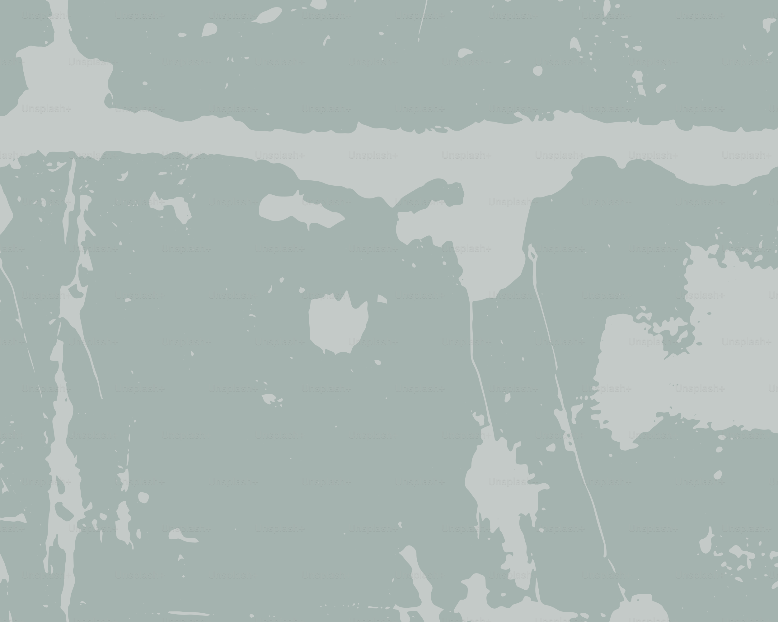 A textured gray background with abstract white markings.