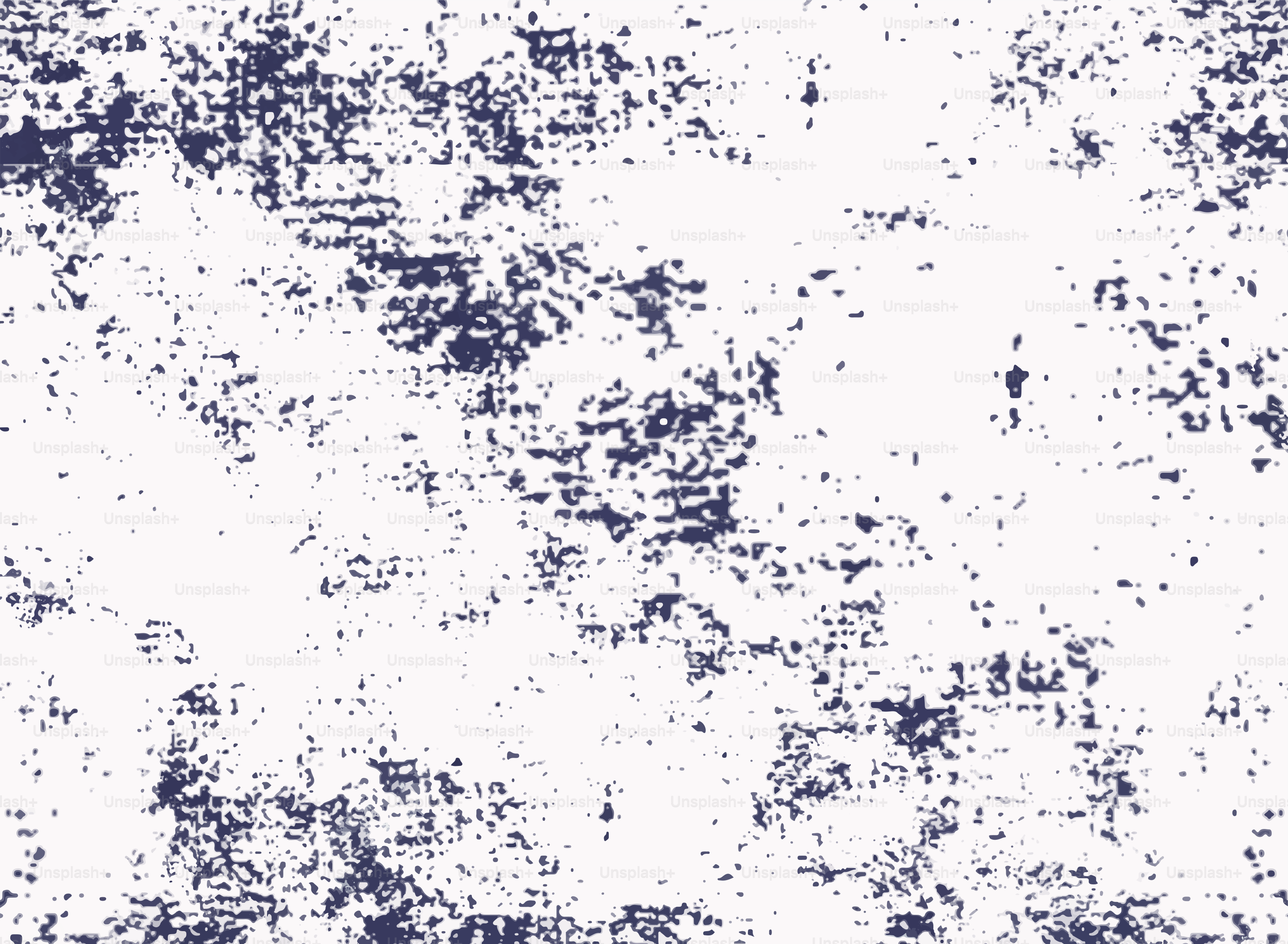 Abstract textured background with dark blue splatters on white