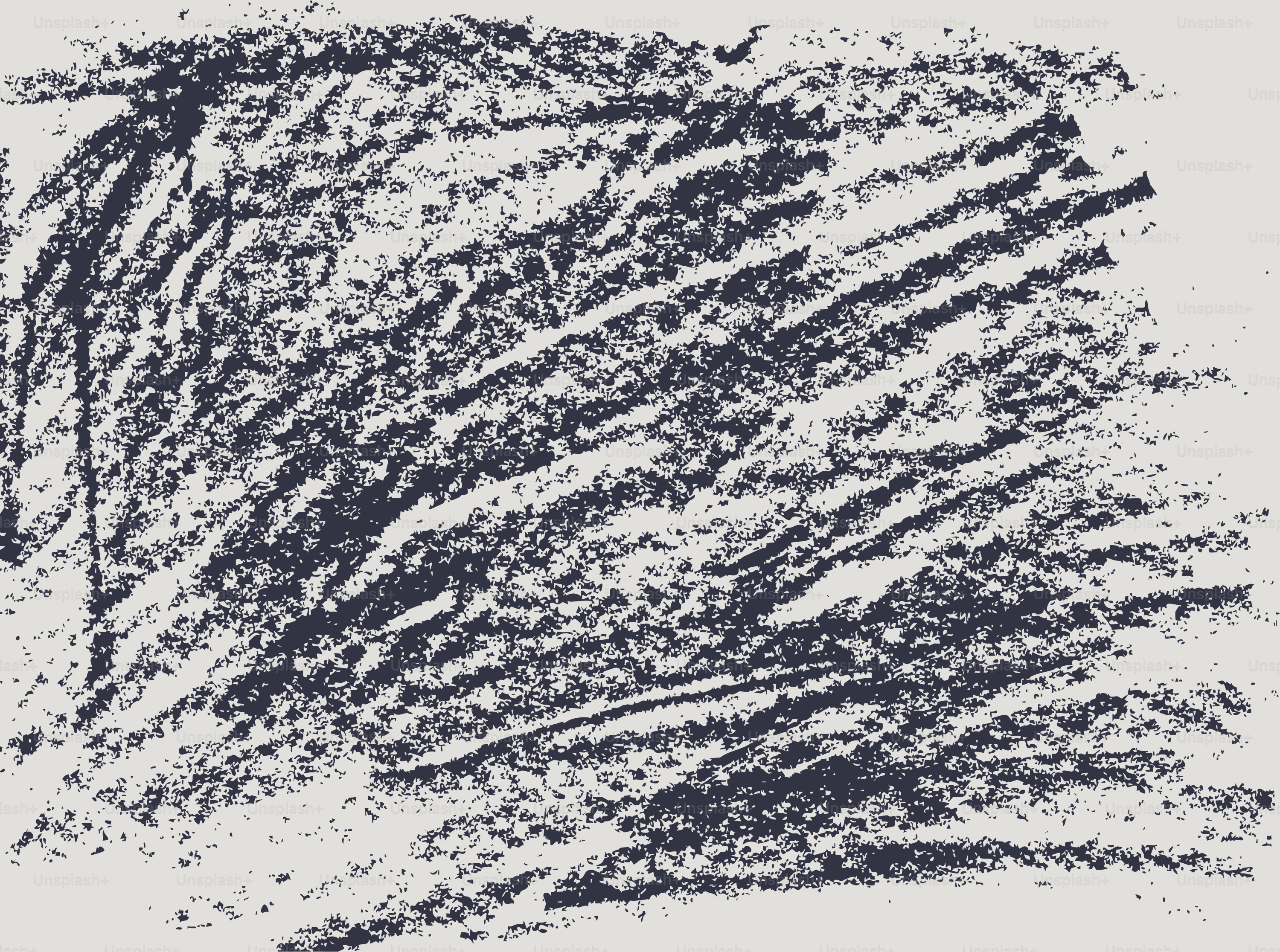 Textured charcoal scribble on a light background