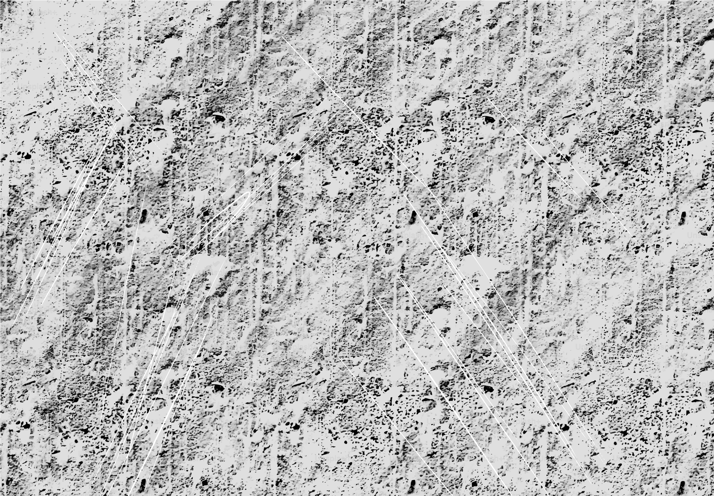 Superficie de hormigón gris texturizado con arañazos e imperfecciones visibles