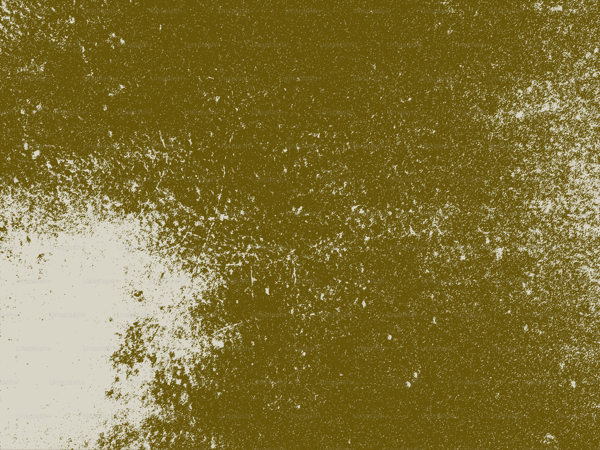A textured surface with white and olive green splotches.