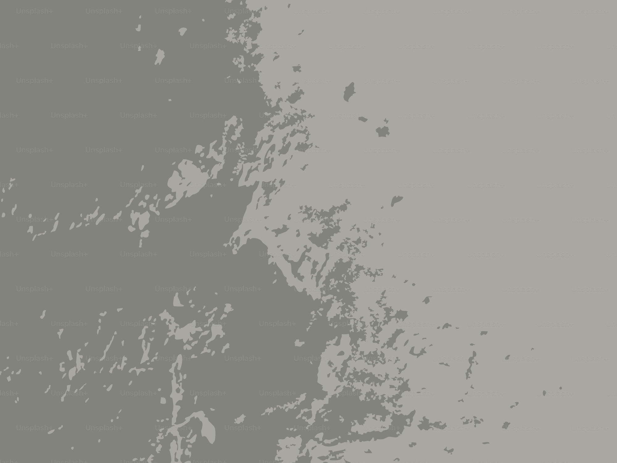 Fondo gris texturizado con salpicaduras abstractas