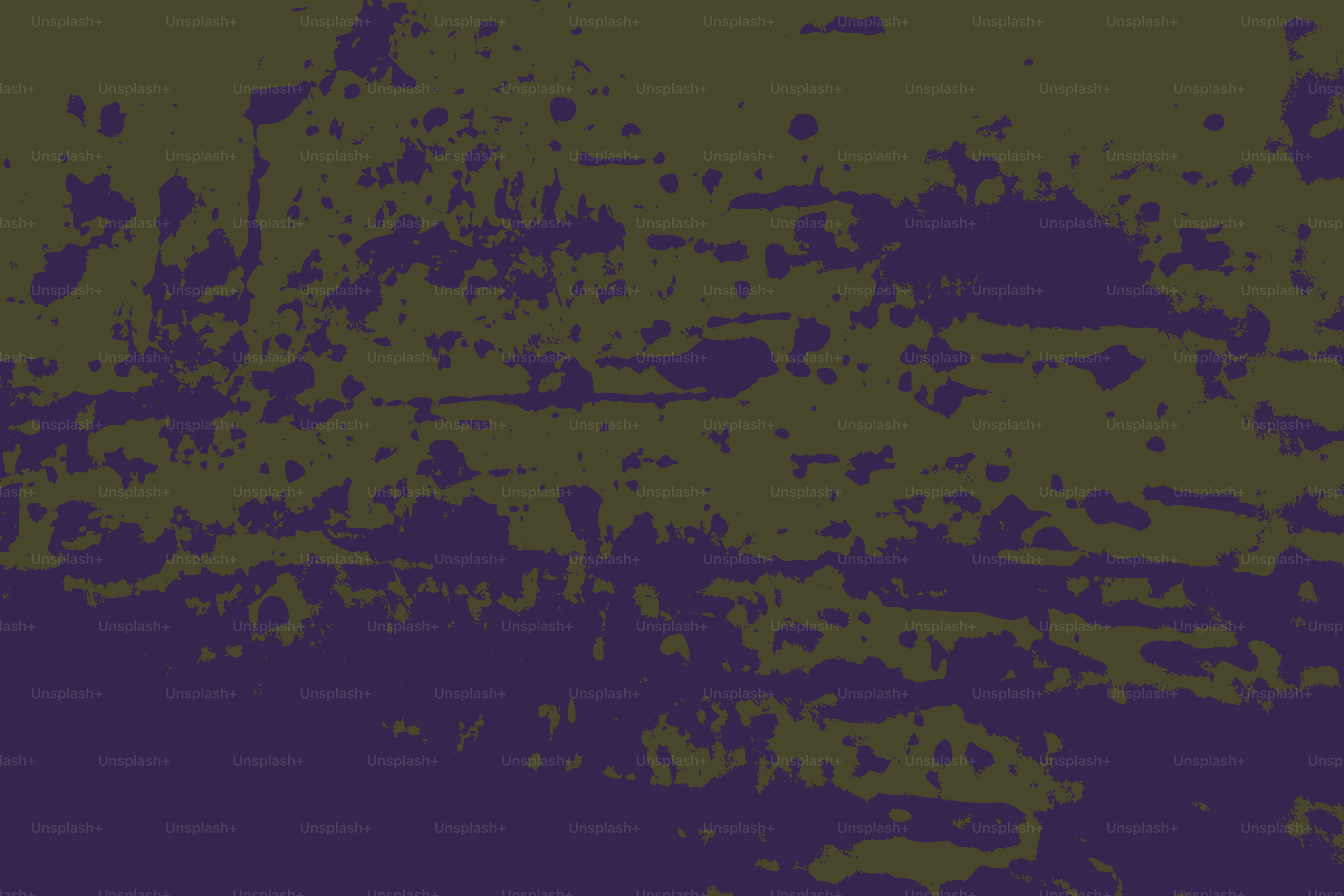 Abstract textured background with purple and green splotches