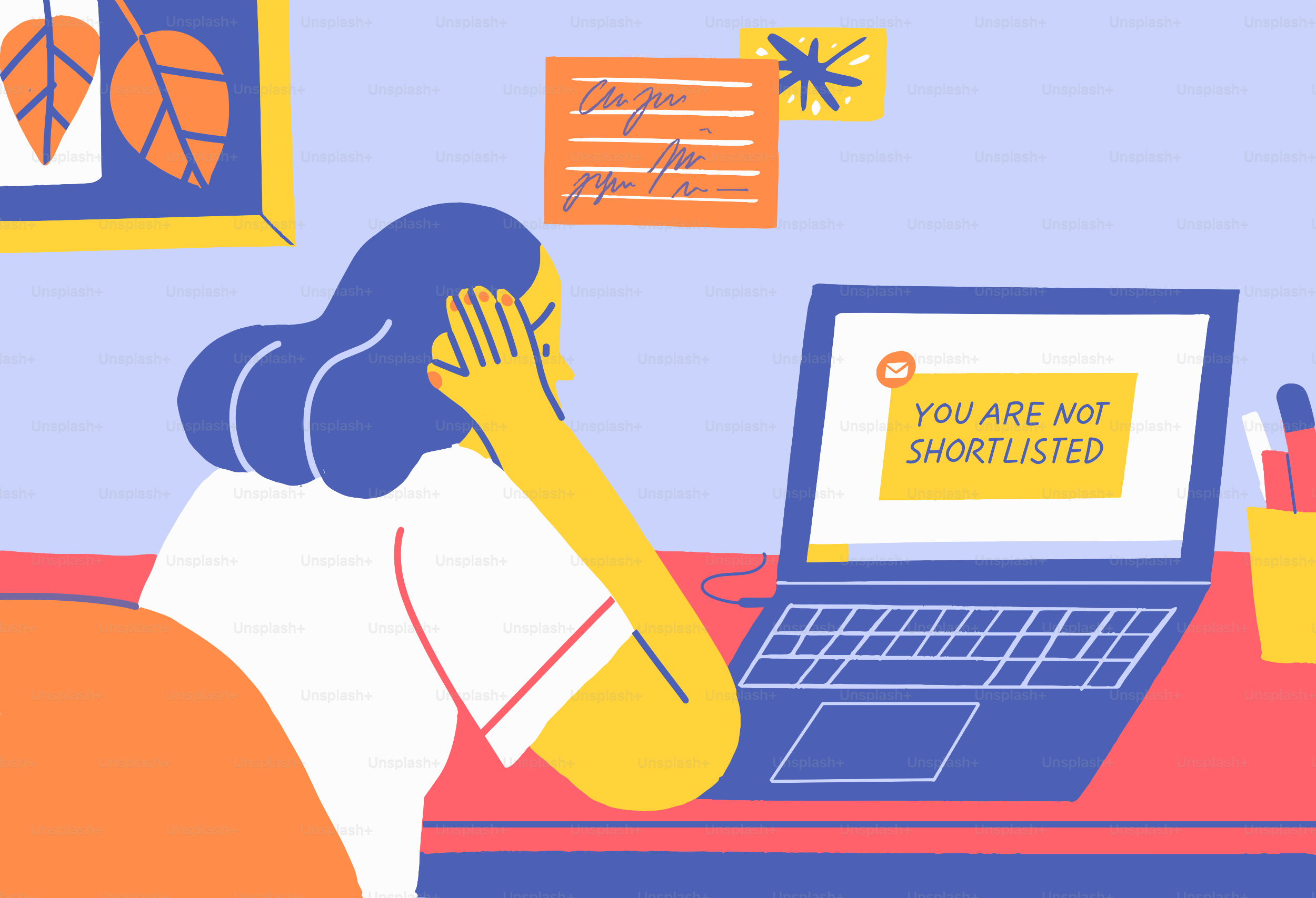 Woman looking at laptop screen with rejection message.