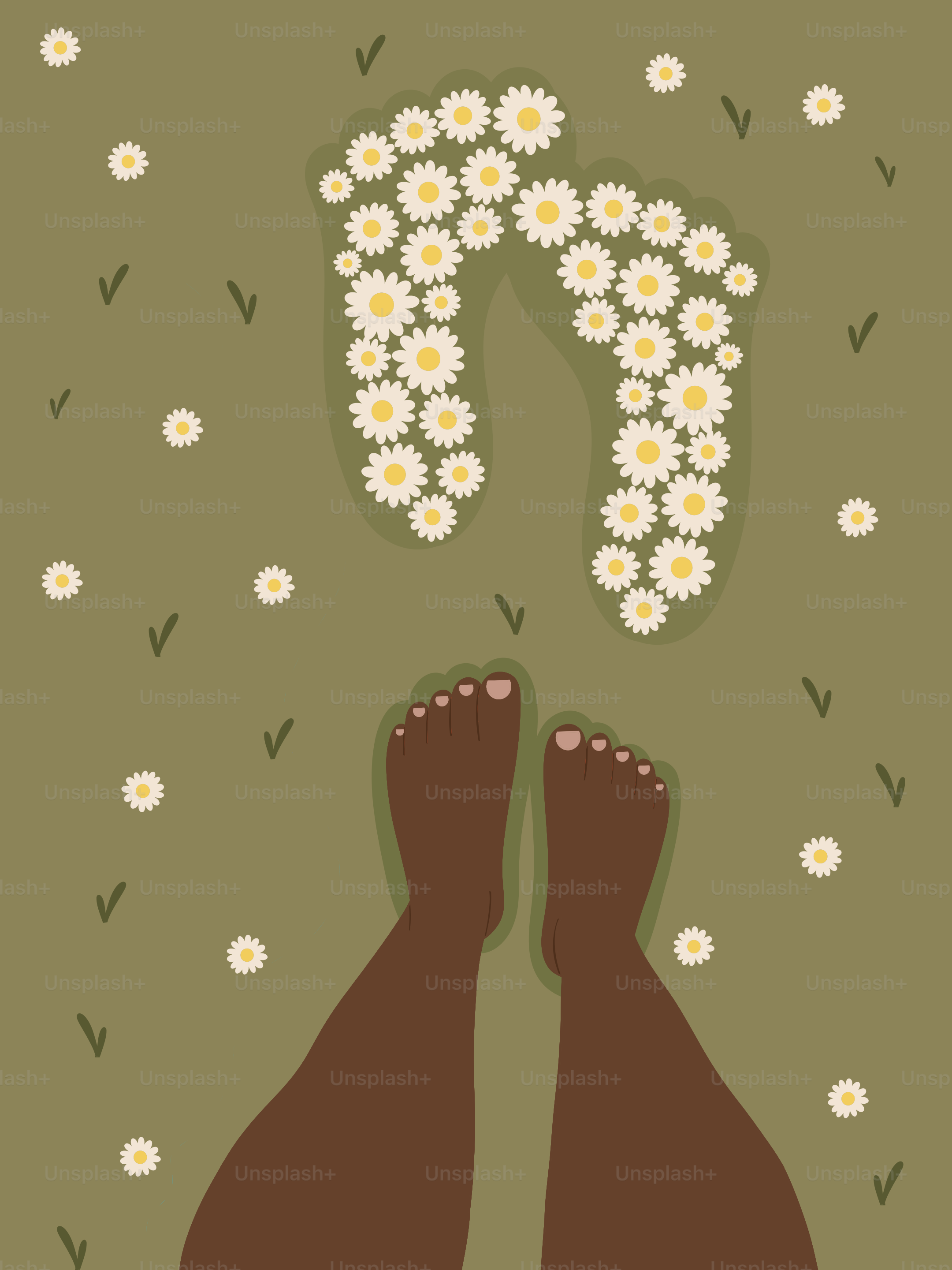 Bare feet in grass with daisy footprints