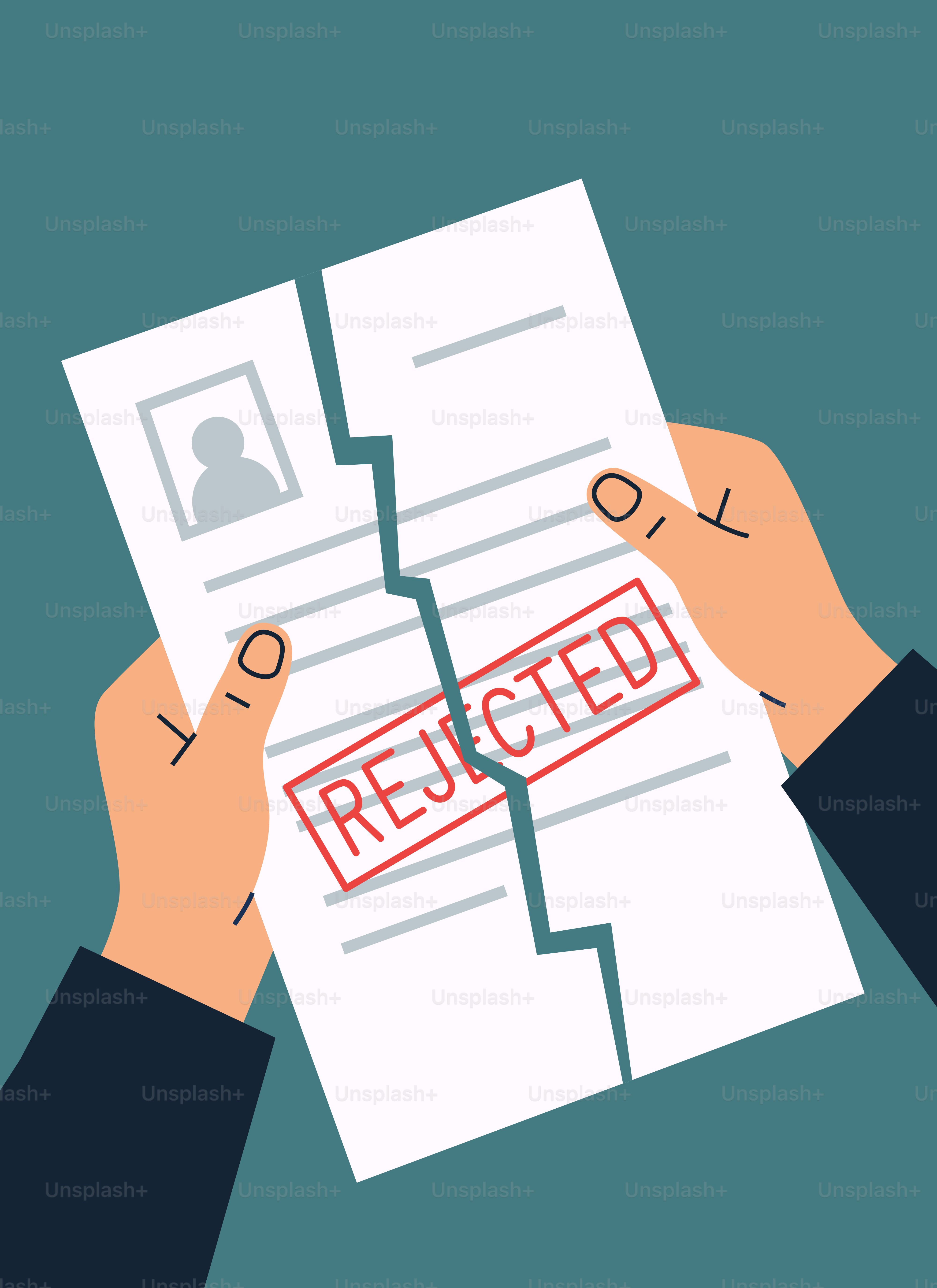 Hands holding a torn document stamped rejected