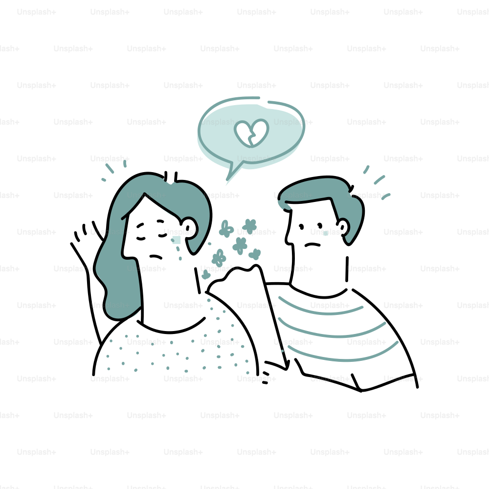 Man comforts woman with broken heart symbol.