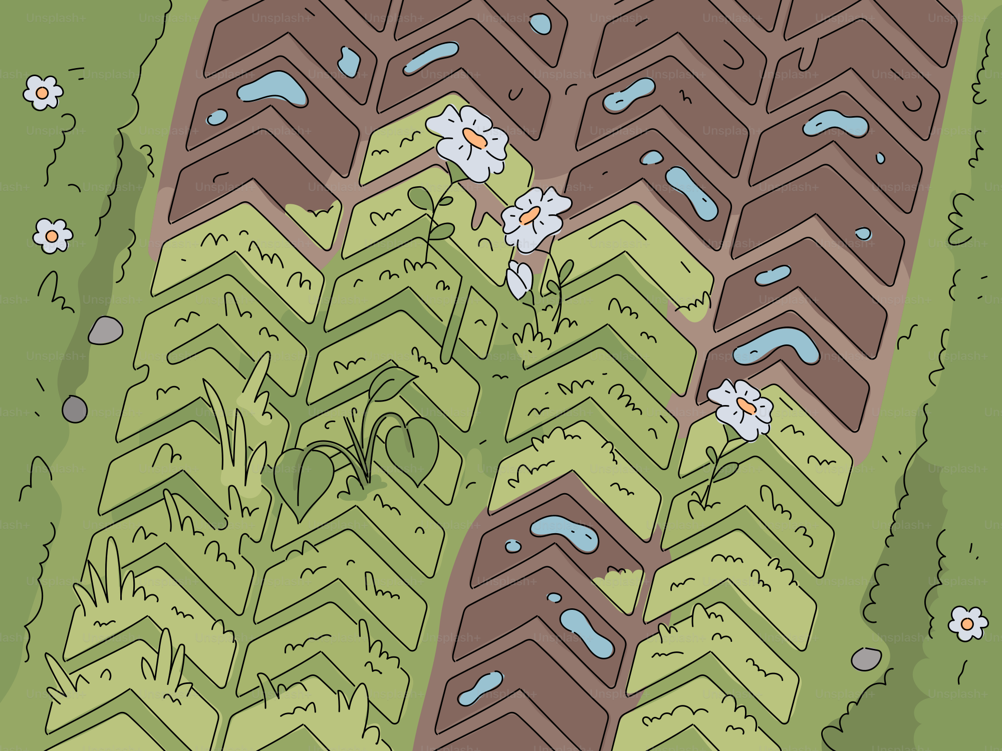 Close-up of tire tracks in grass with flowers